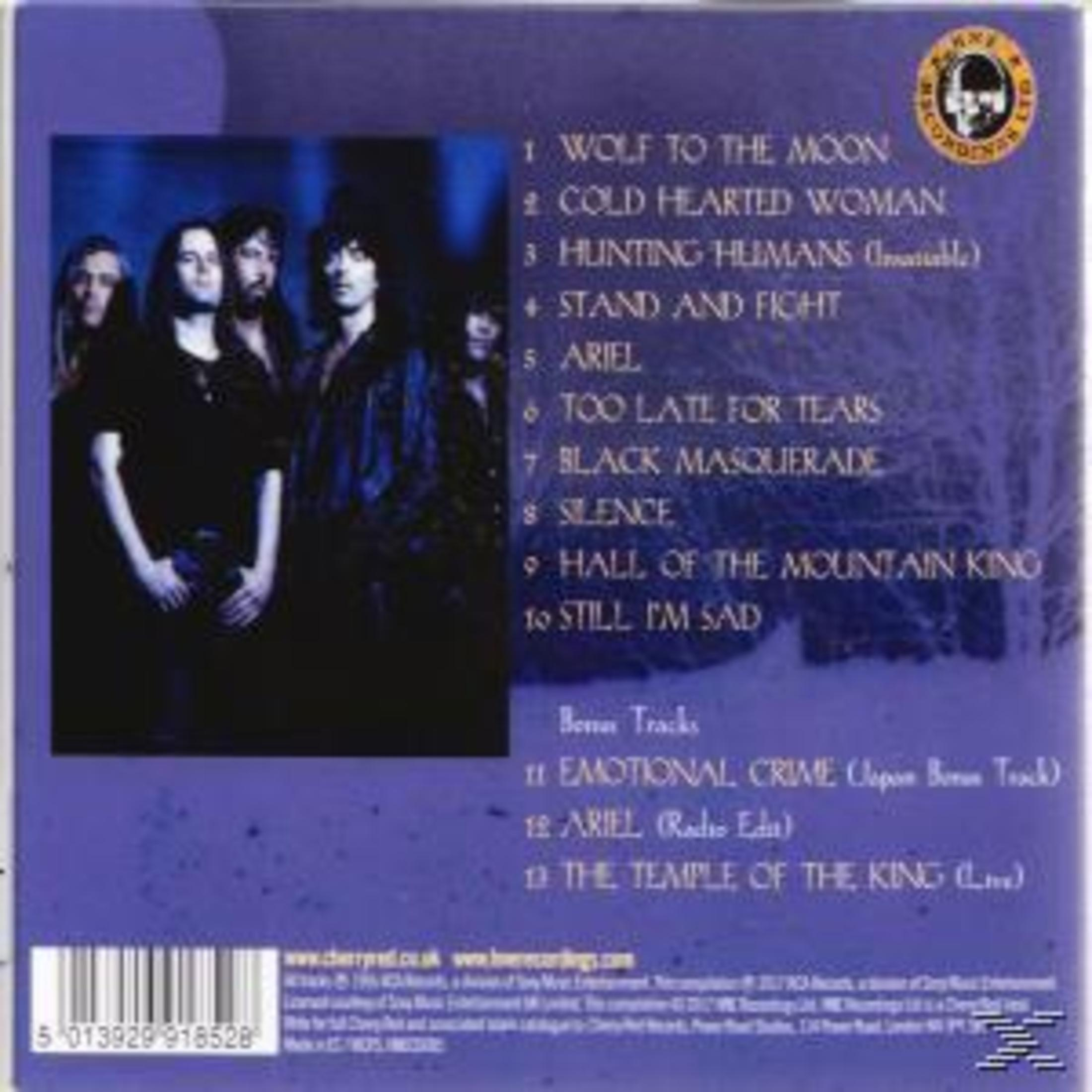 Albumcover mit Bandfoto. Text listet Songs auf: Wolf to the Moon, Cold Hearted Woman und andere. Unten ist ein Barcode.