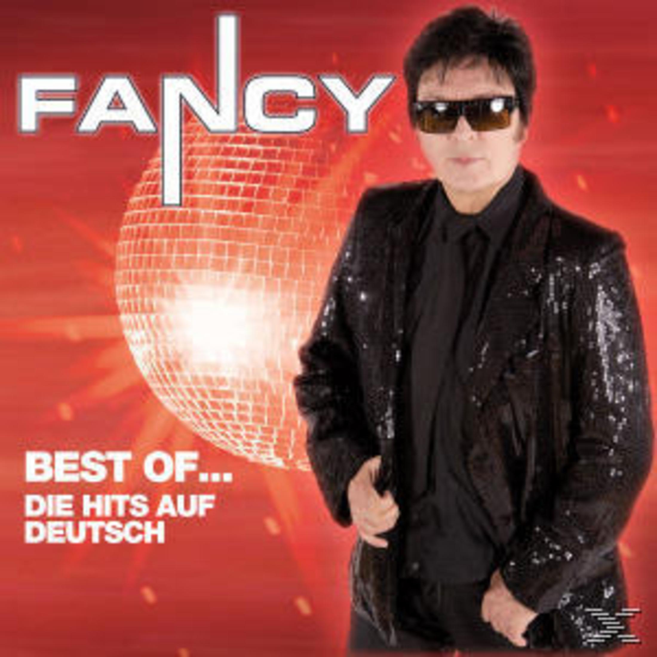 Albumcover von Fancy, trägt eine Paillettenjacke und eine Sonnenbrille. Im Hintergrund befindet sich eine Discokugel, der Titel lautet "Best of...".