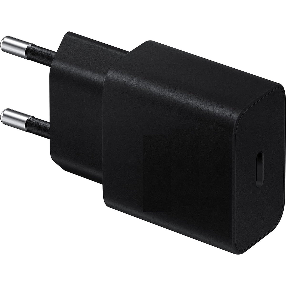 A black Samsung phone charger with two silver prongs. The charger has a rectangular body and a small slot on the side.