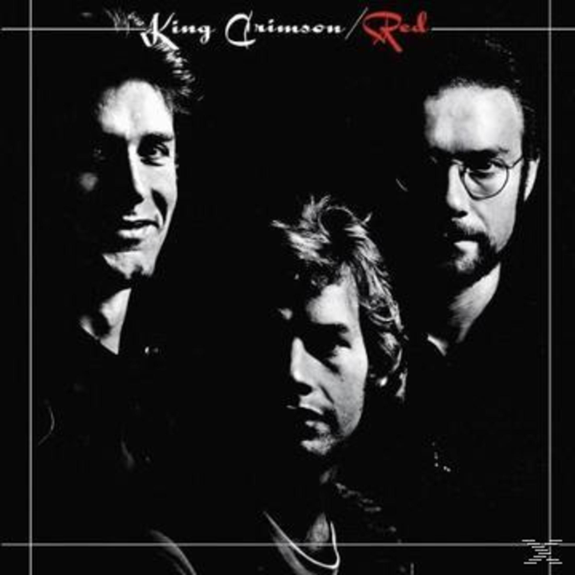 Album cover of King Crimson's 'Red'. Three men's faces in black and white, with the band's name and album title at the top.