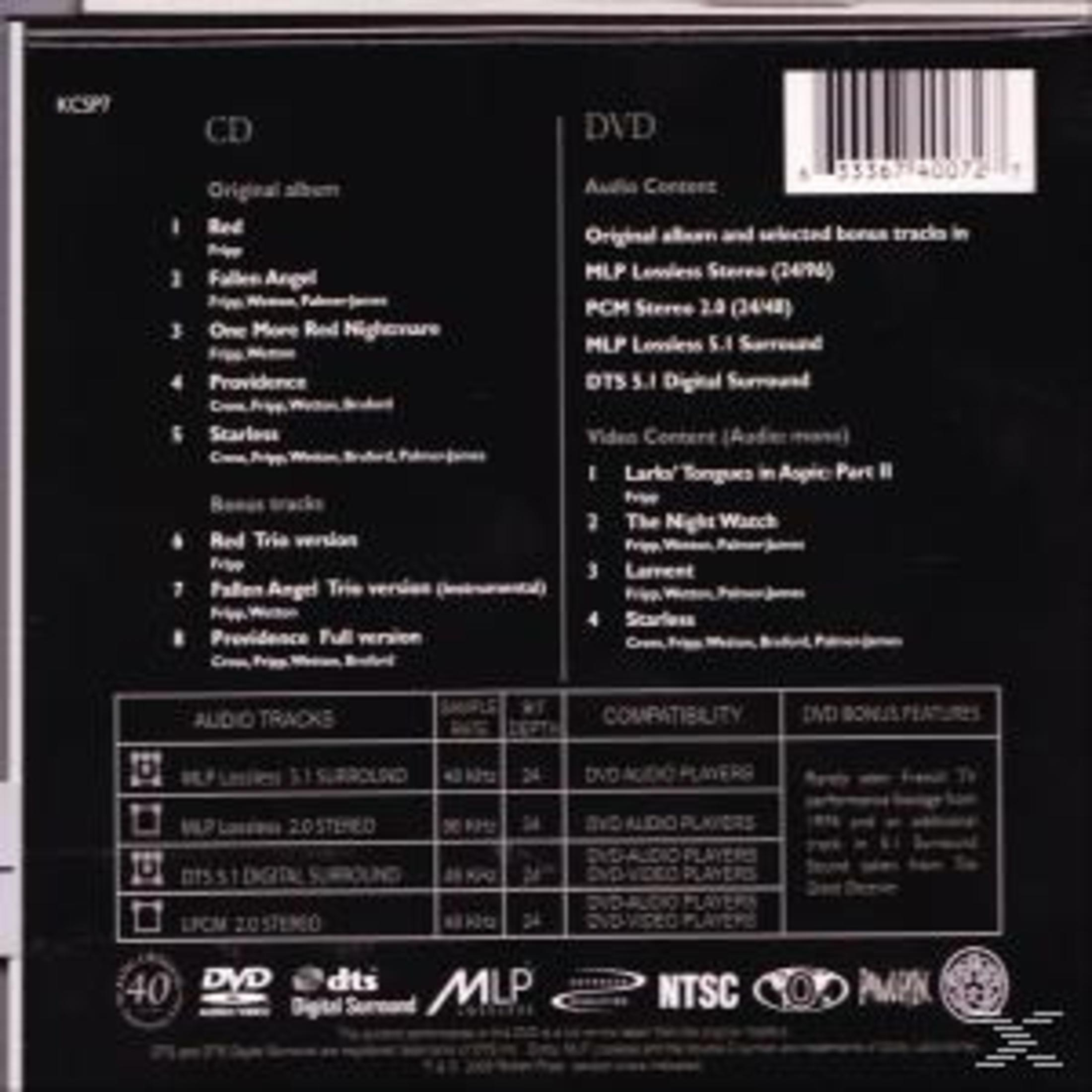A CD/DVD case with track listings, audio specs, and compatibility details. Text is white on a dark background.