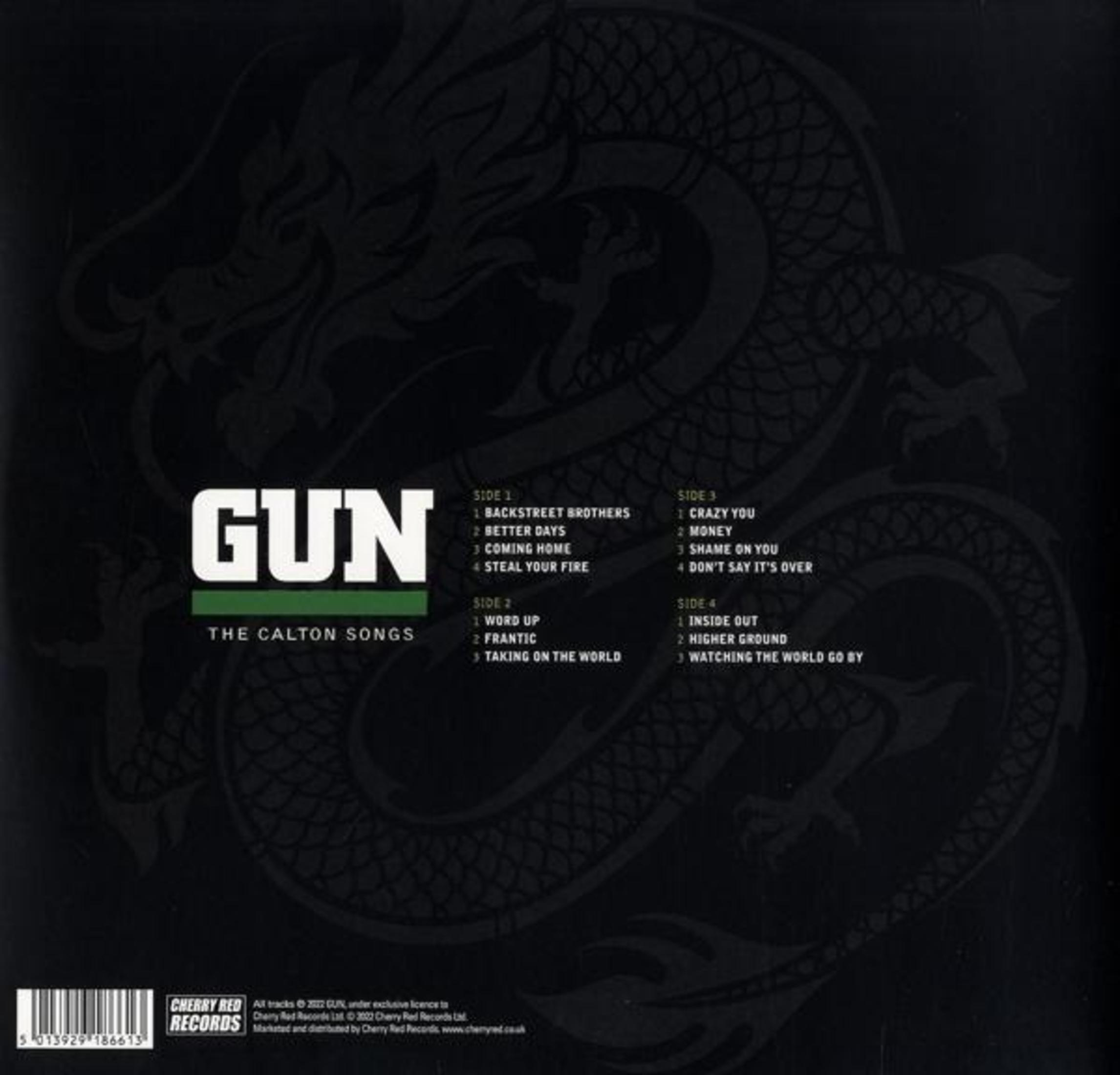 Copertina dell'album. Sfondo nero con contorno di drago. Titolo dell'album 'GUN' e tracklist visibili.