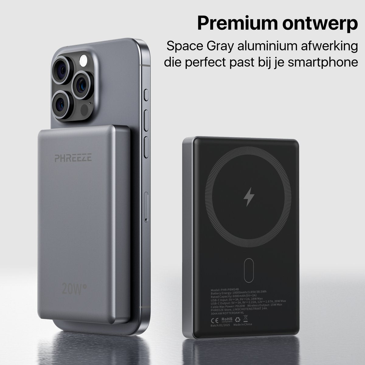 Een grijze telefoon met een magnetische powerbank bevestigd en een andere powerbank aan de zijkant, beide met het merk PHREEZE.