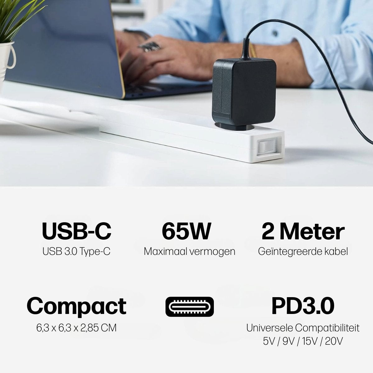 A black USB-C charger plugged into a white power strip. A laptop is in the background. Text indicates 65W, 2m cable, and PD3.0.