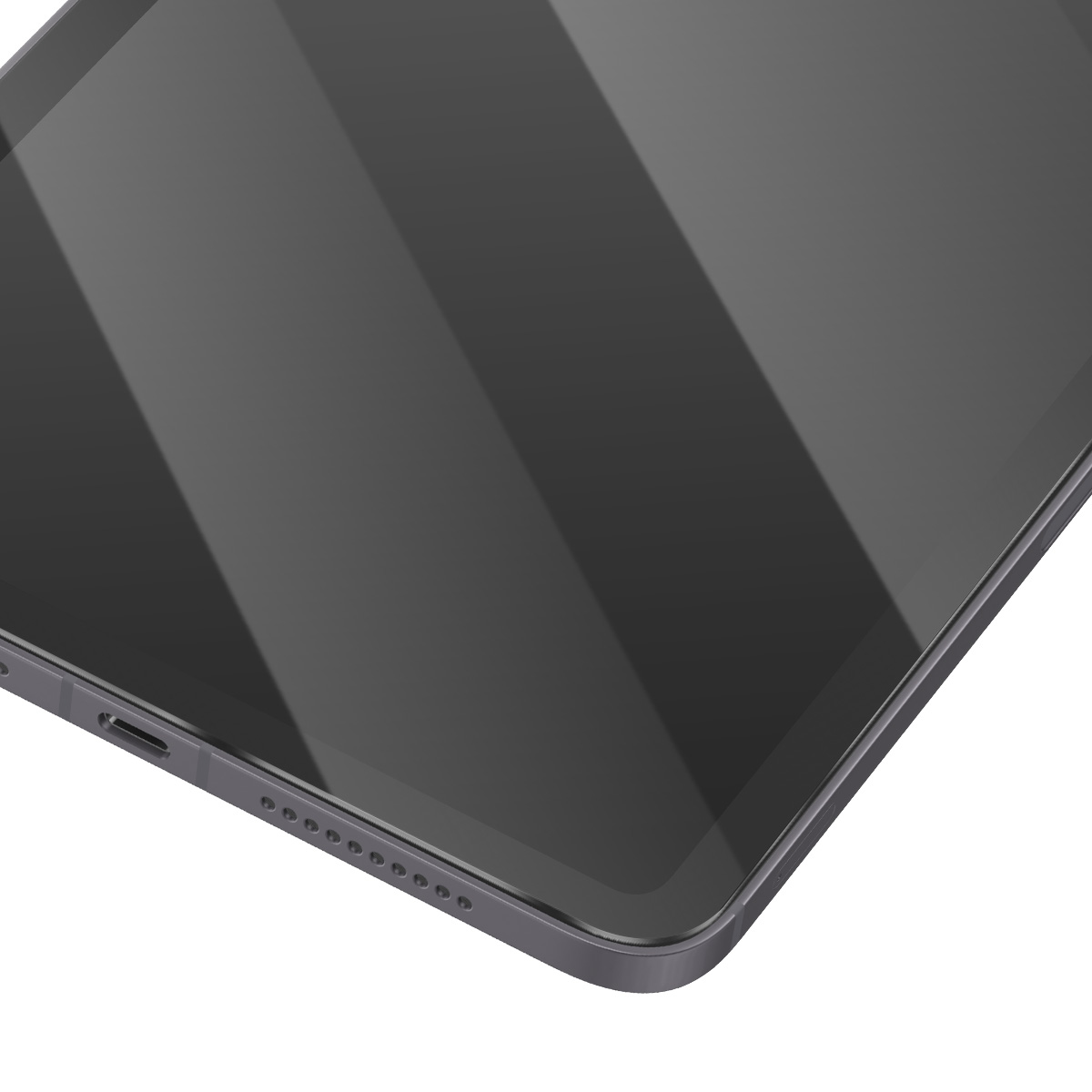 Close-up van een donkergrijze tablet. Het scherm reflecteert licht. Het apparaat heeft een poort en kleine luidsprekergaten.