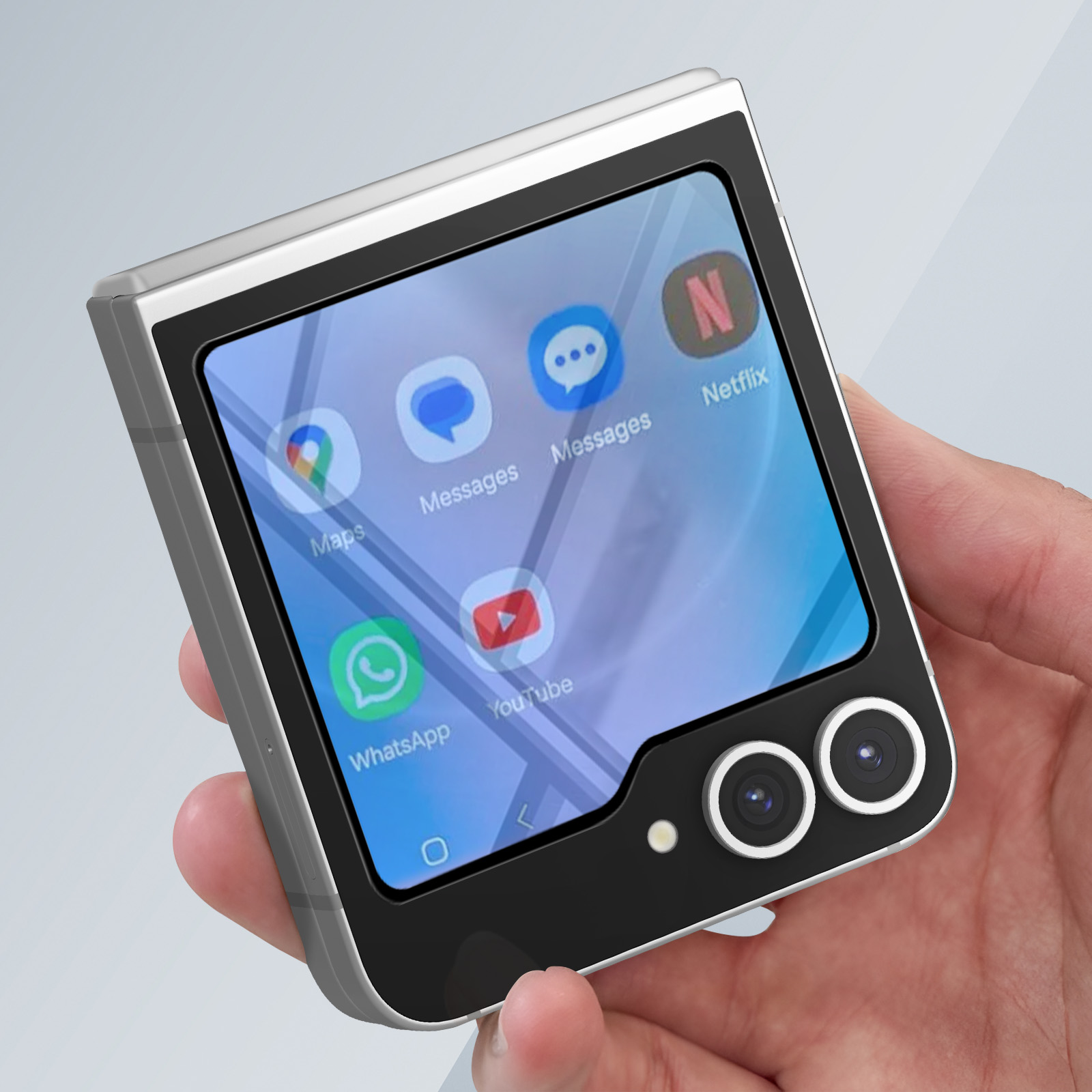 Una mano tiene un telefono flip con icone di app: Maps, Messages, Netflix, WhatsApp e YouTube. Doppie fotocamere visibili.