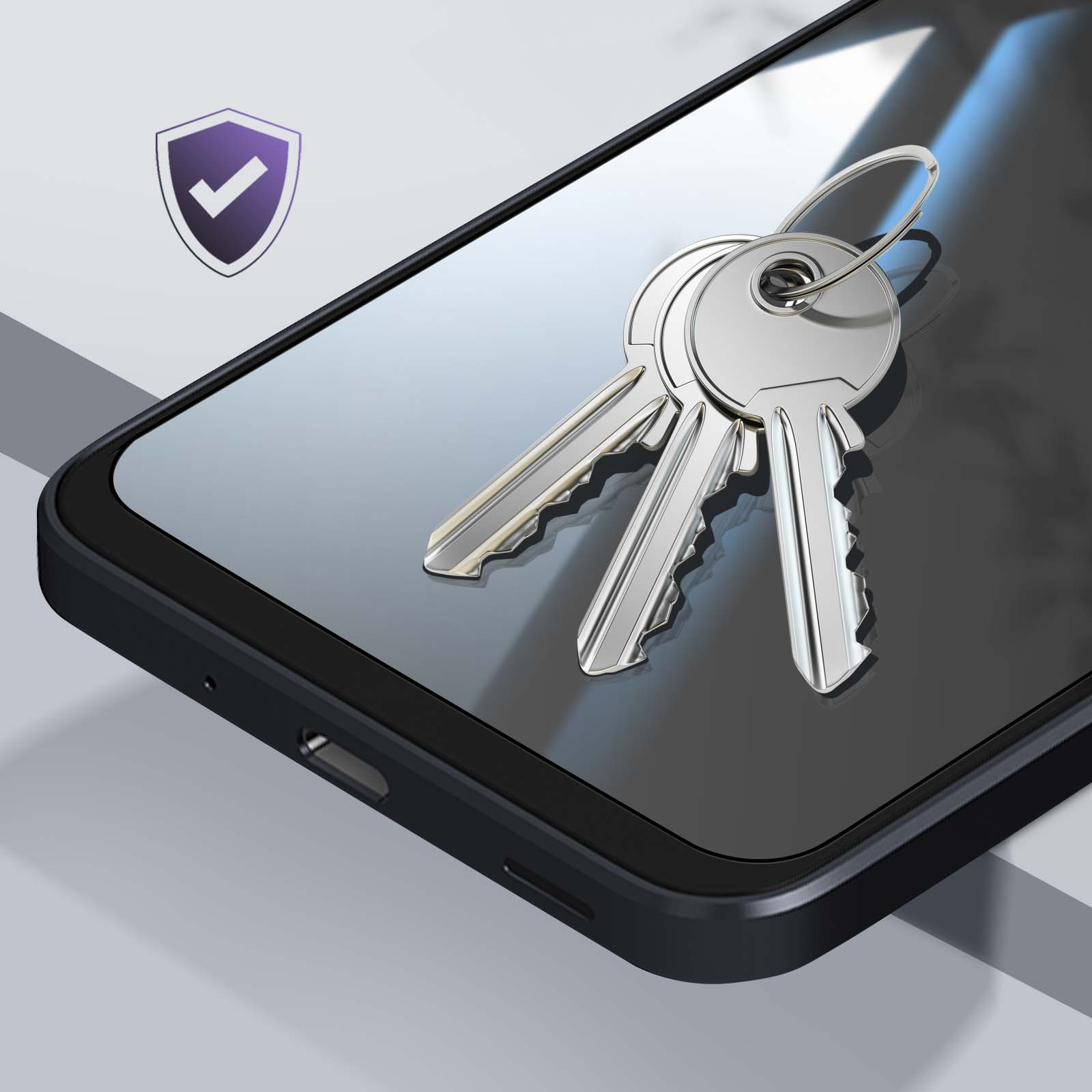 Chiavi appoggiate sullo schermo di un telefono. Icona scudo sullo sfondo. Focus sulla sicurezza e protezione del telefono.