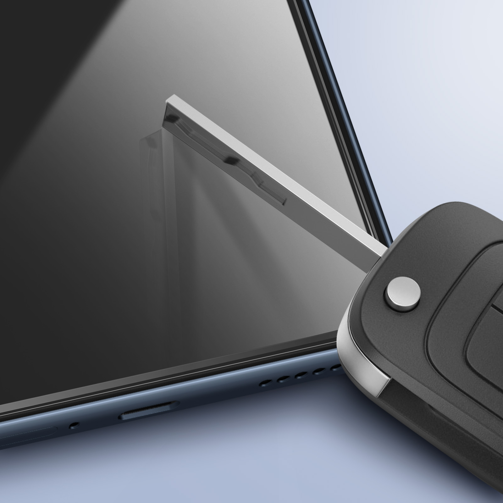 Una chiave per auto nera è accanto a uno smartphone nero. La lama argentata della chiave tocca lo schermo. Sfondo azzurro.