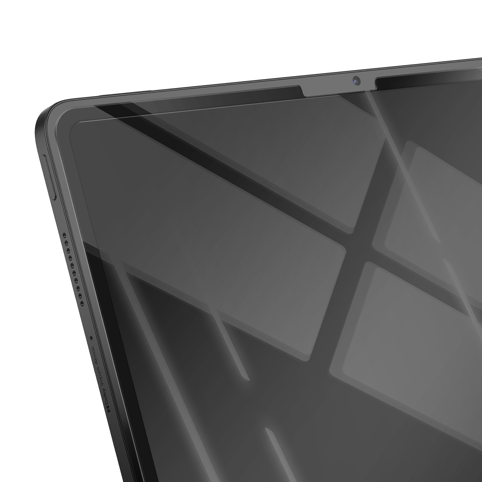 Primo piano di un tablet grigio scuro. Lo schermo è riflettente e mostra riflessi di luce. La fotocamera è visibile. Il bordo presenta fori per altoparlanti.