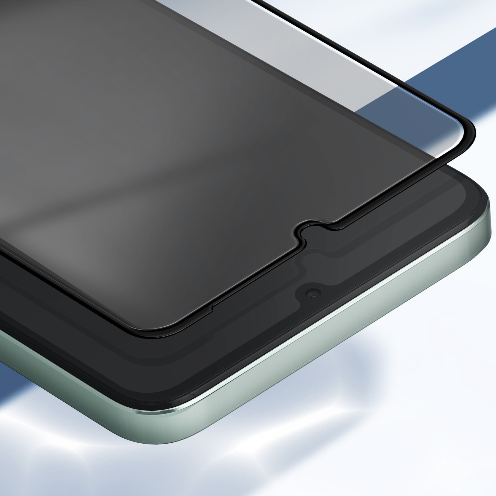Primo piano di uno smartphone con protezione schermo applicata. Il telefono è argento-verde, con schermo scuro.