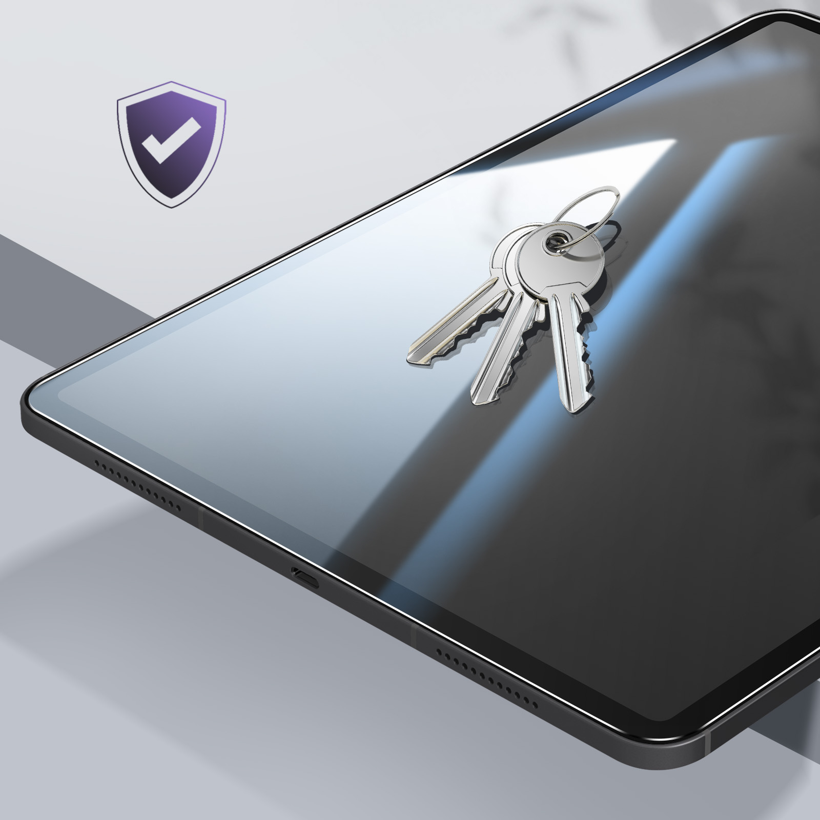 Un tablet con chiavi sopra. Un'icona dello scudo di sicurezza è in alto a sinistra.