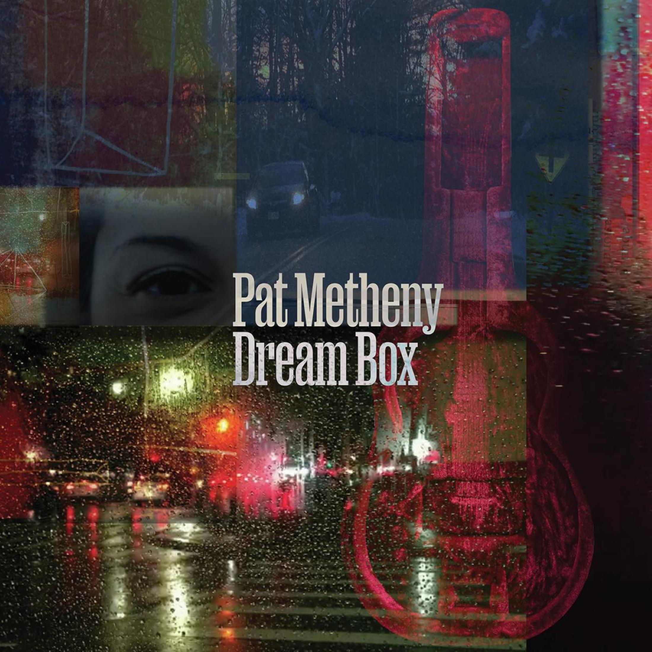 Copertina dell'album con vetro appannato dalla pioggia. Titolo: Pat Metheny Dream Box. Presenta un'auto, un occhio e luci della città.
