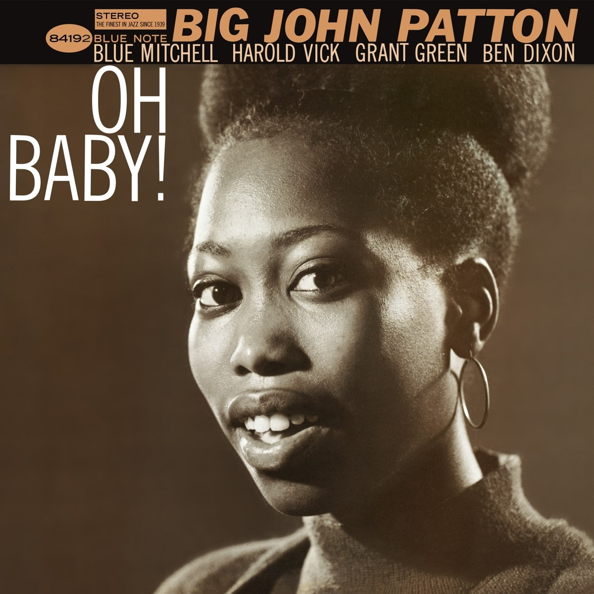 Copertina dell'album. Ritratto di una donna nera sorridente con capelli corti, orecchini a cerchio e bocca aperta. Sovrapposizione di testo: "Big John Patton".