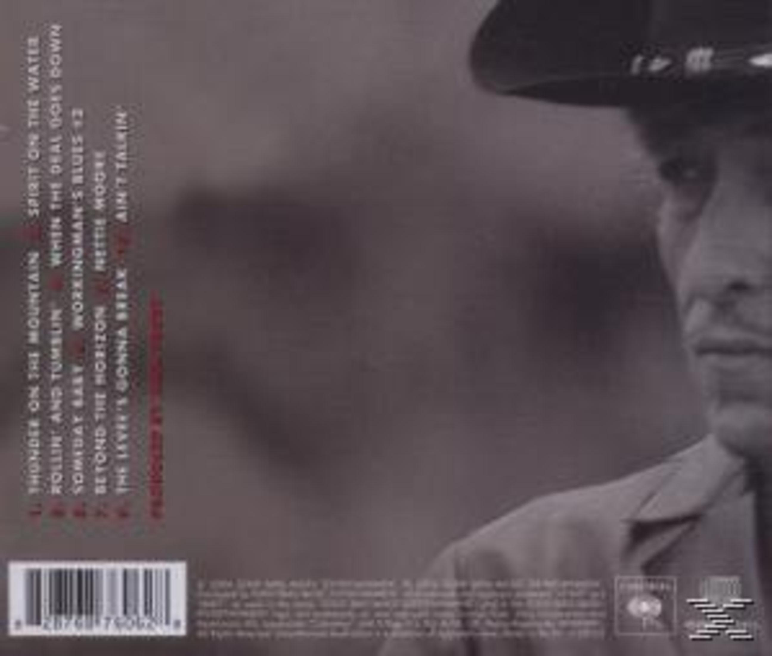 Copertina dell'album con un uomo con un cappello da cowboy. Il testo riporta i titoli delle canzoni e il nome dell'artista.