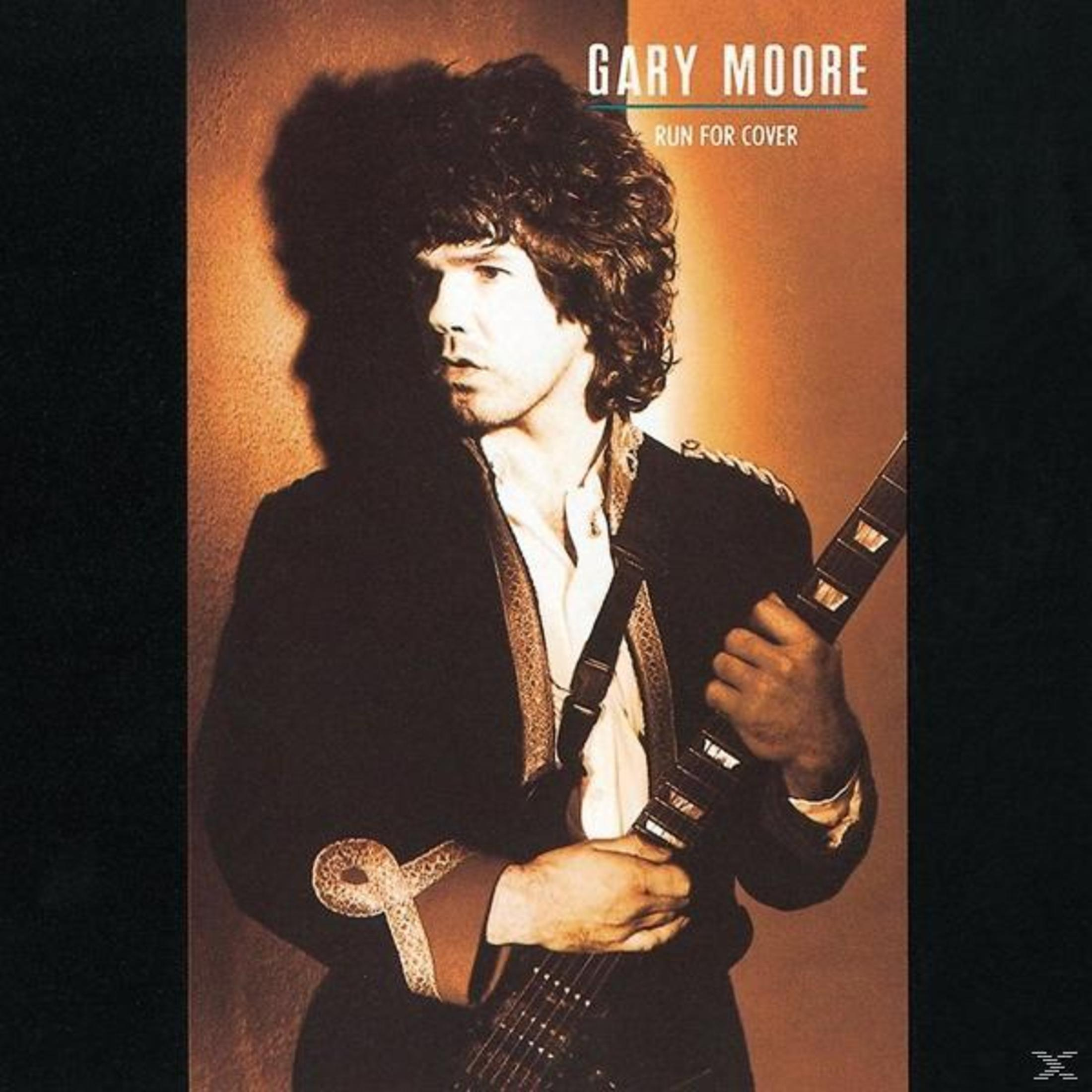 Copertina dell'album. Gary Moore con chitarra, giacca nera, camicia bianca. Testo: Gary Moore, Run For Cover.