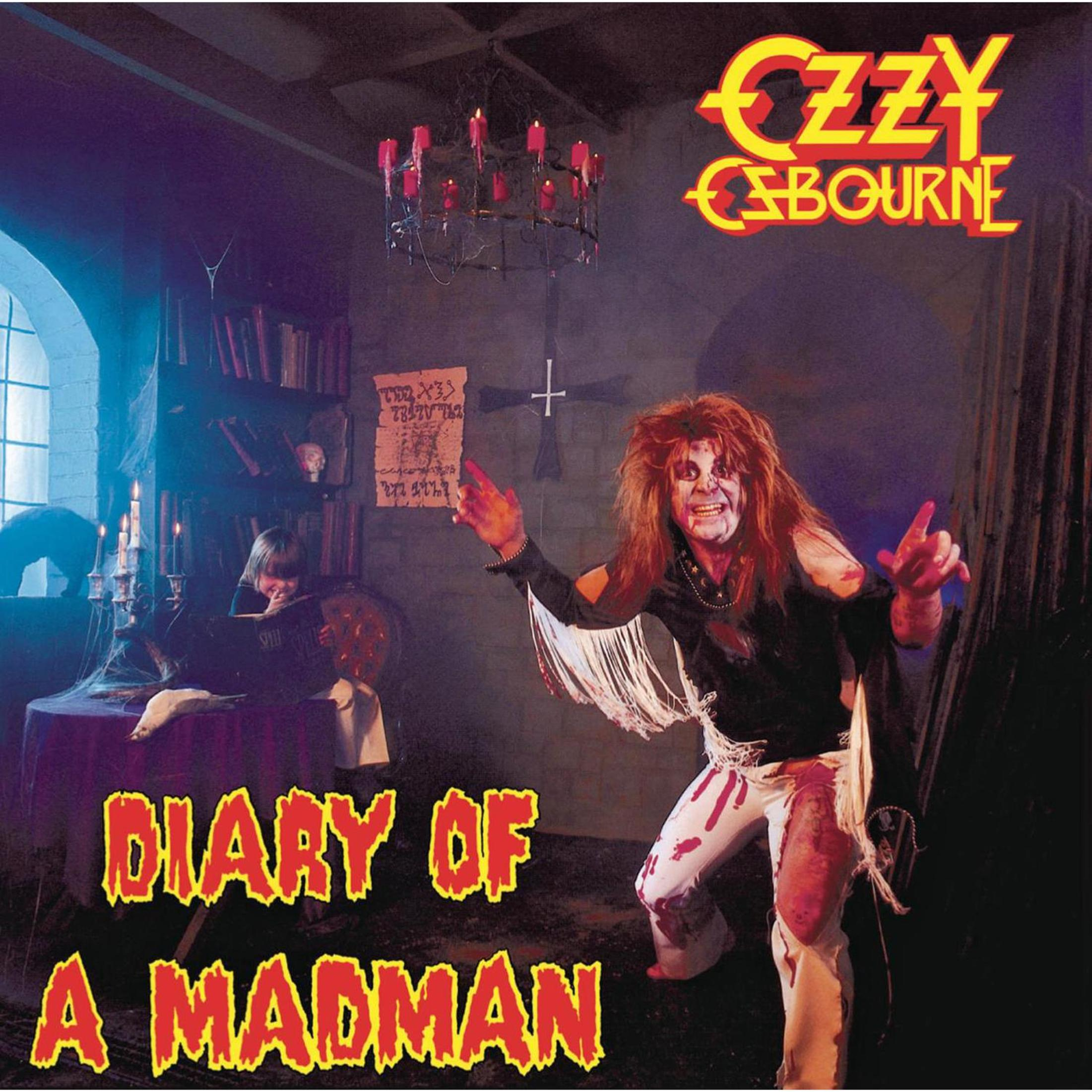 Copertina dell'album di Ozzy Osbourne. Indossa trucco, pantaloni bianchi e camicia nera. Lo sfondo presenta una croce, un bambino che legge e un lampadario.