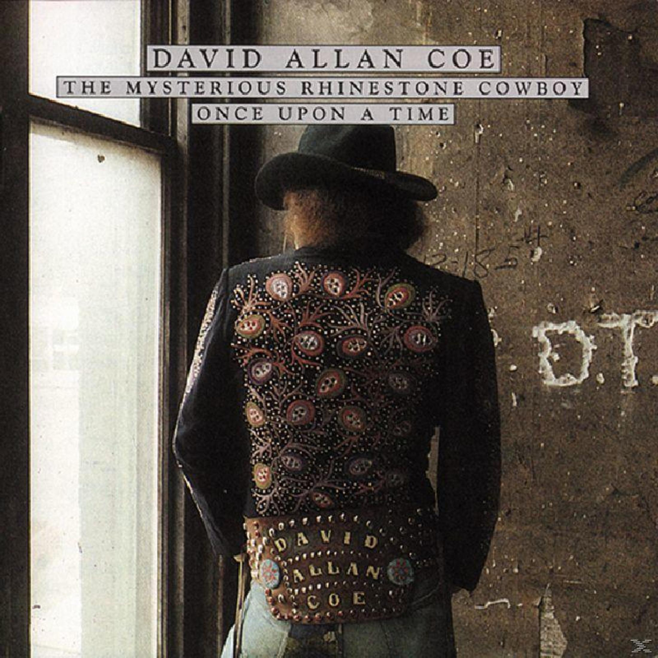 Albumcover. Mann in glitzernder Jacke, Hut und Jeans. Der Text lautet 'David Allan Coe, The Mysterious Rhinestone Cowboy'.