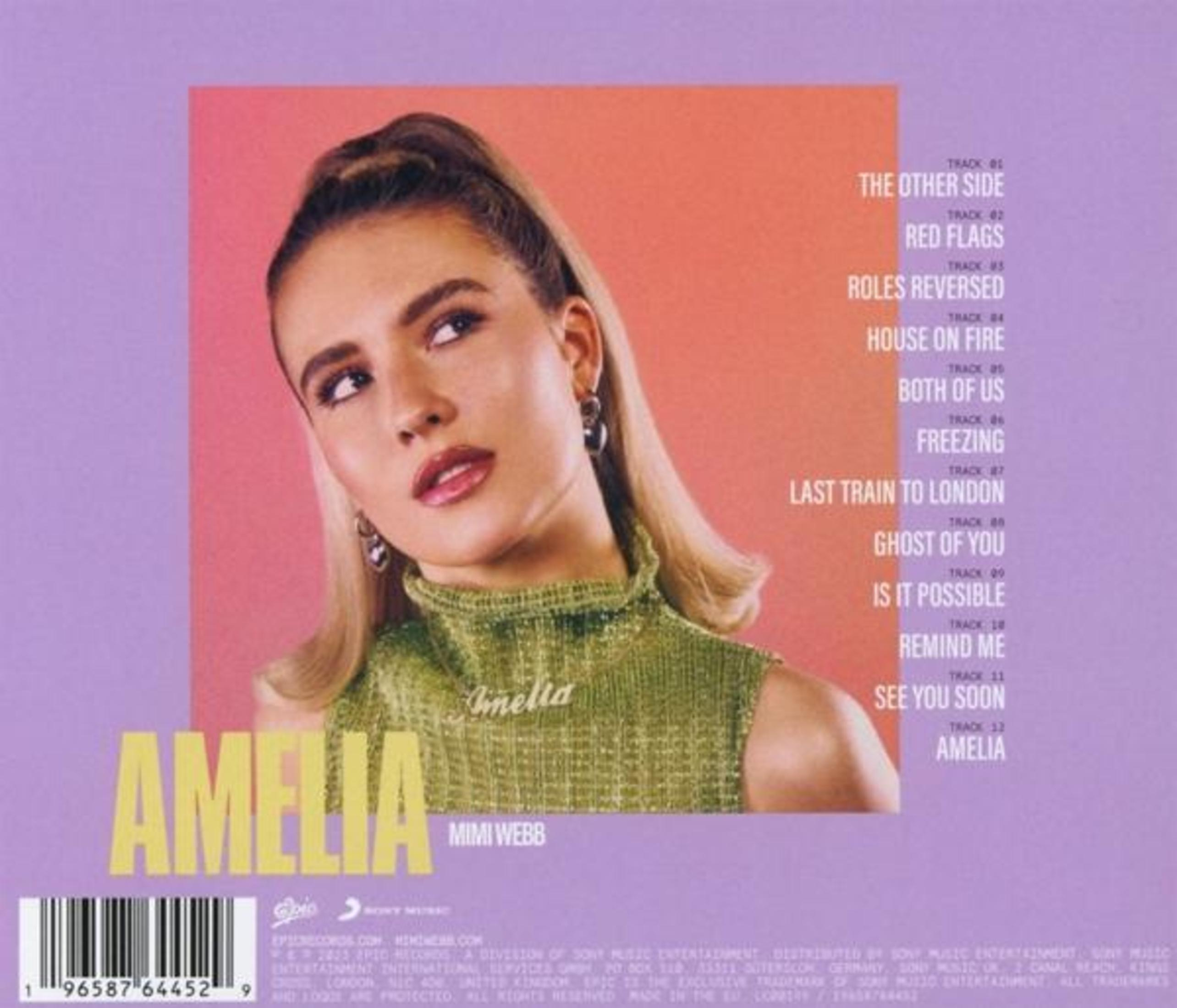 Albumcover von Amelia von Mimi Webb. Es zeigt eine Frau mit blonden Haaren und einem grünen Oberteil und die Titelliste.