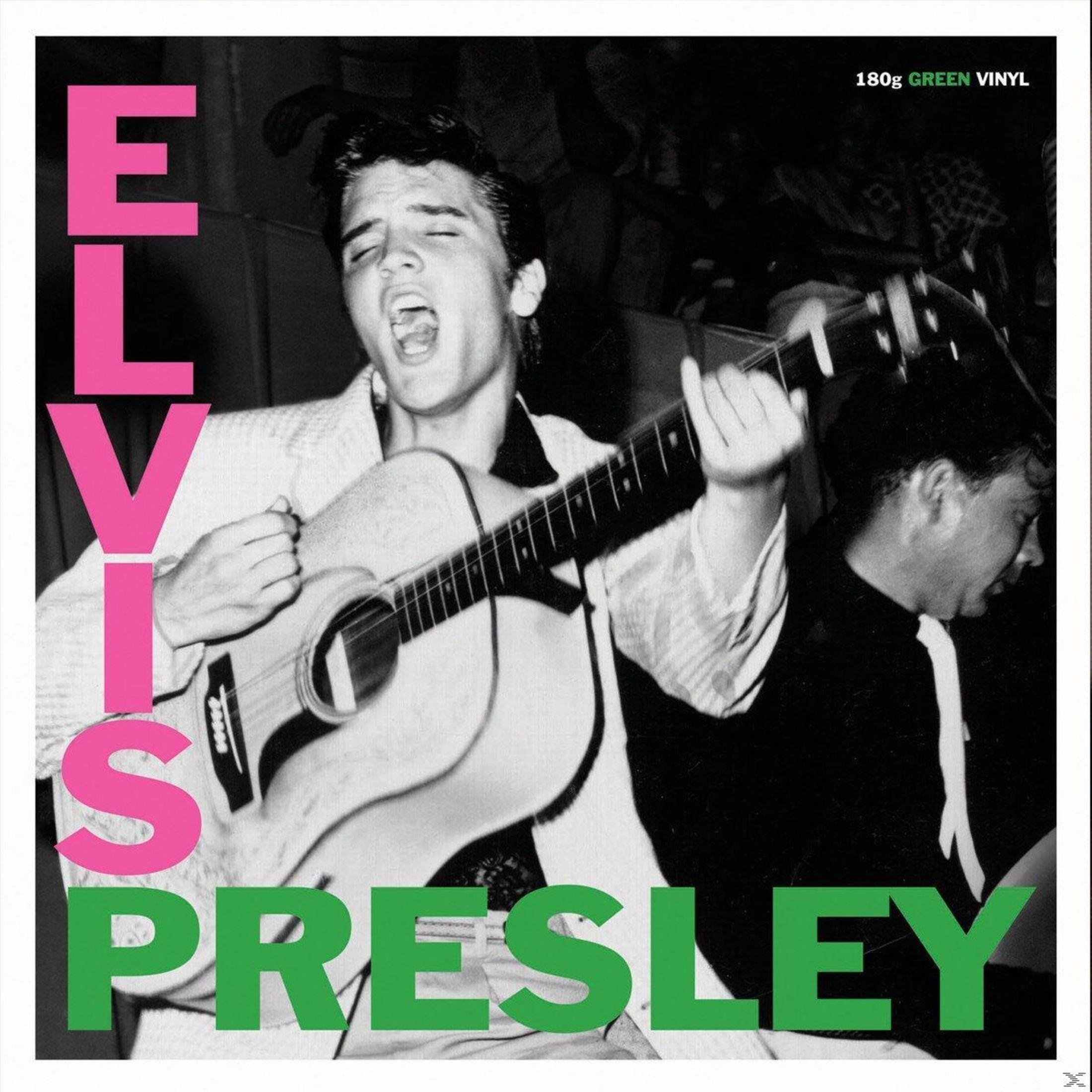 Elvis Presley che suona la chitarra, canta, copertina dell'album con testo rosa e verde. Foto in bianco e nero.