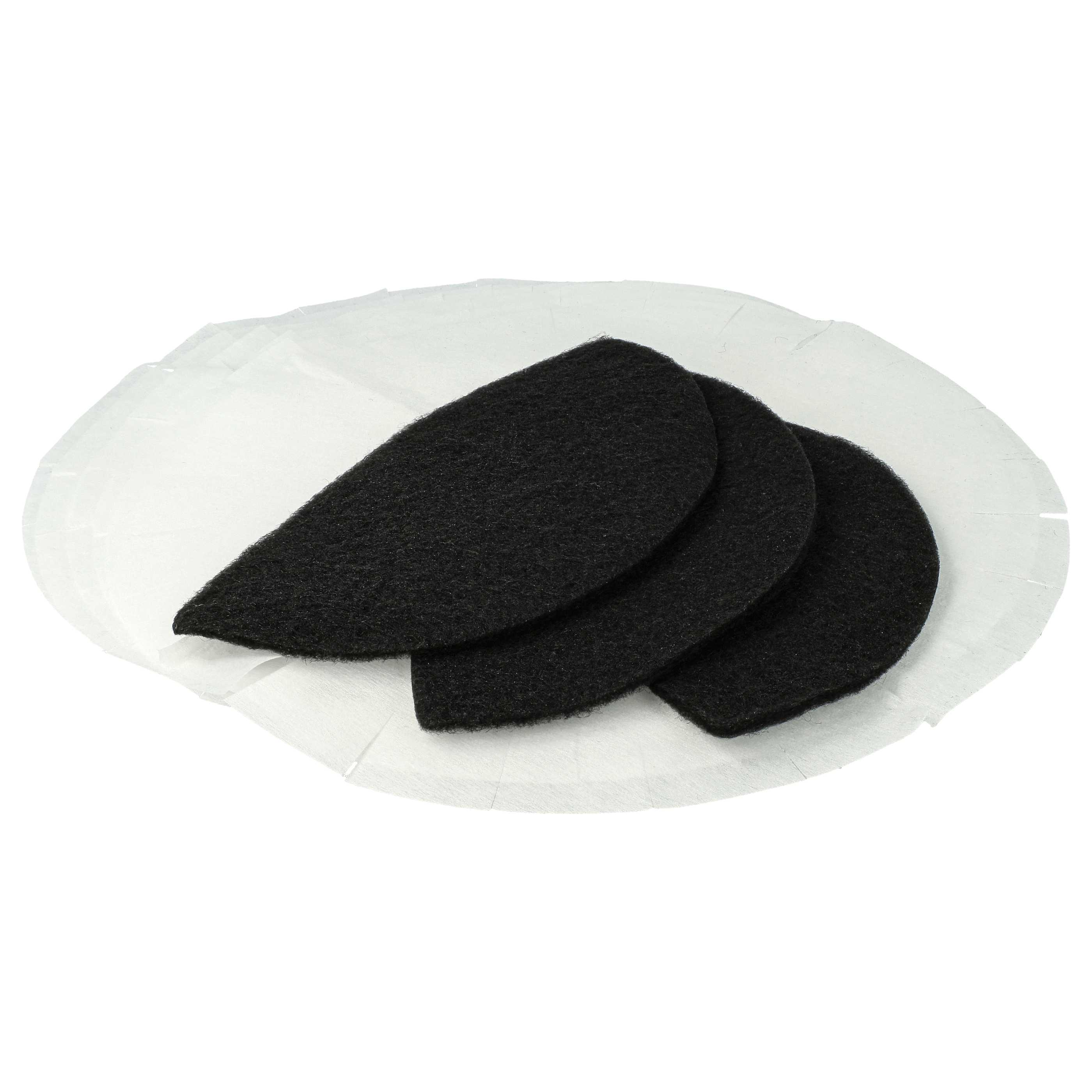Drei schwarze, halbmondförmige Objekte liegen auf einer weißen, zerknitterten Oberfläche, alles vor weißem Hintergrund.