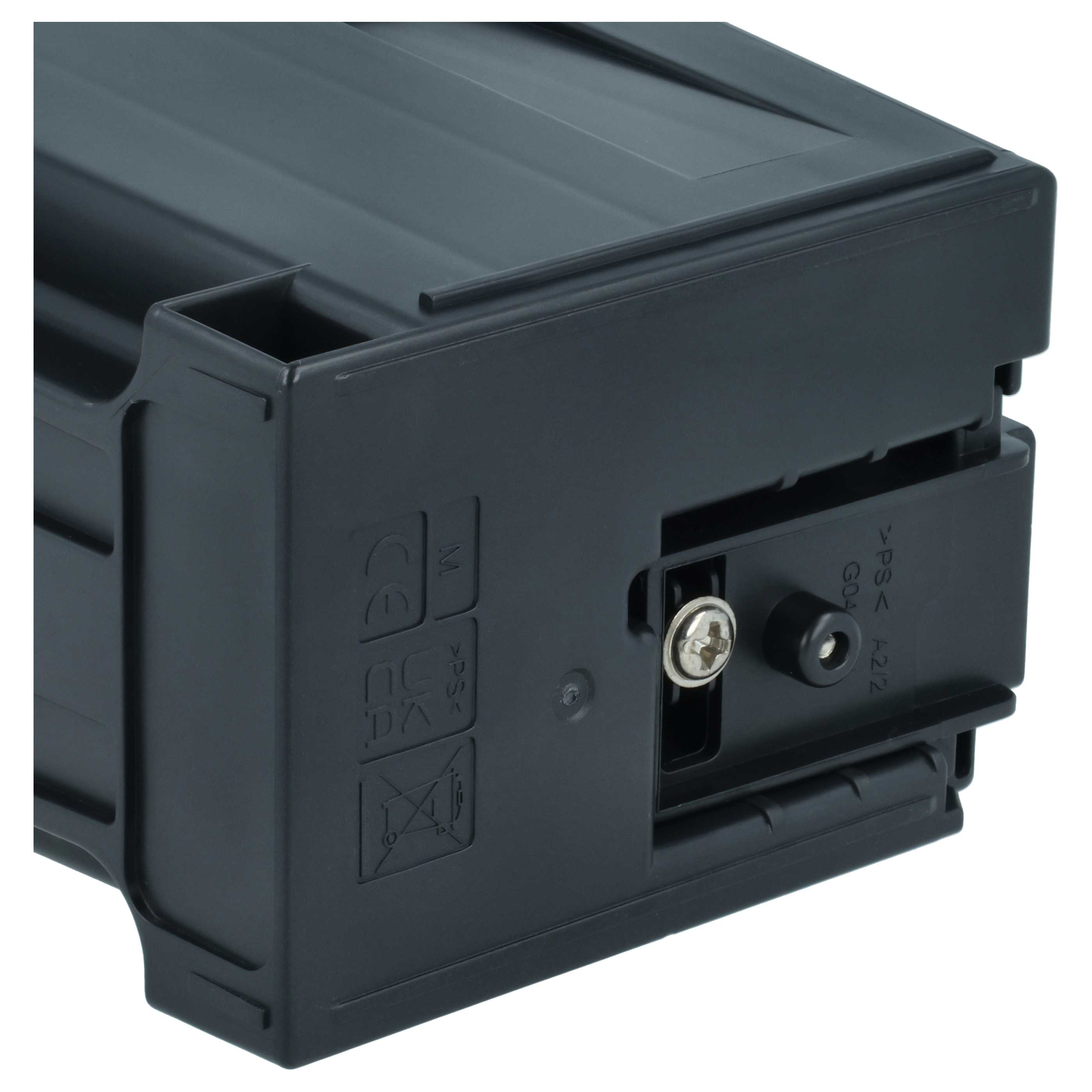 Nahaufnahme einer schwarzen Kunststoffkomponente mit Schrauben und Markierungen. Sie hat eine rechteckige Form, glatte Oberflächen und abgerundete Kanten.