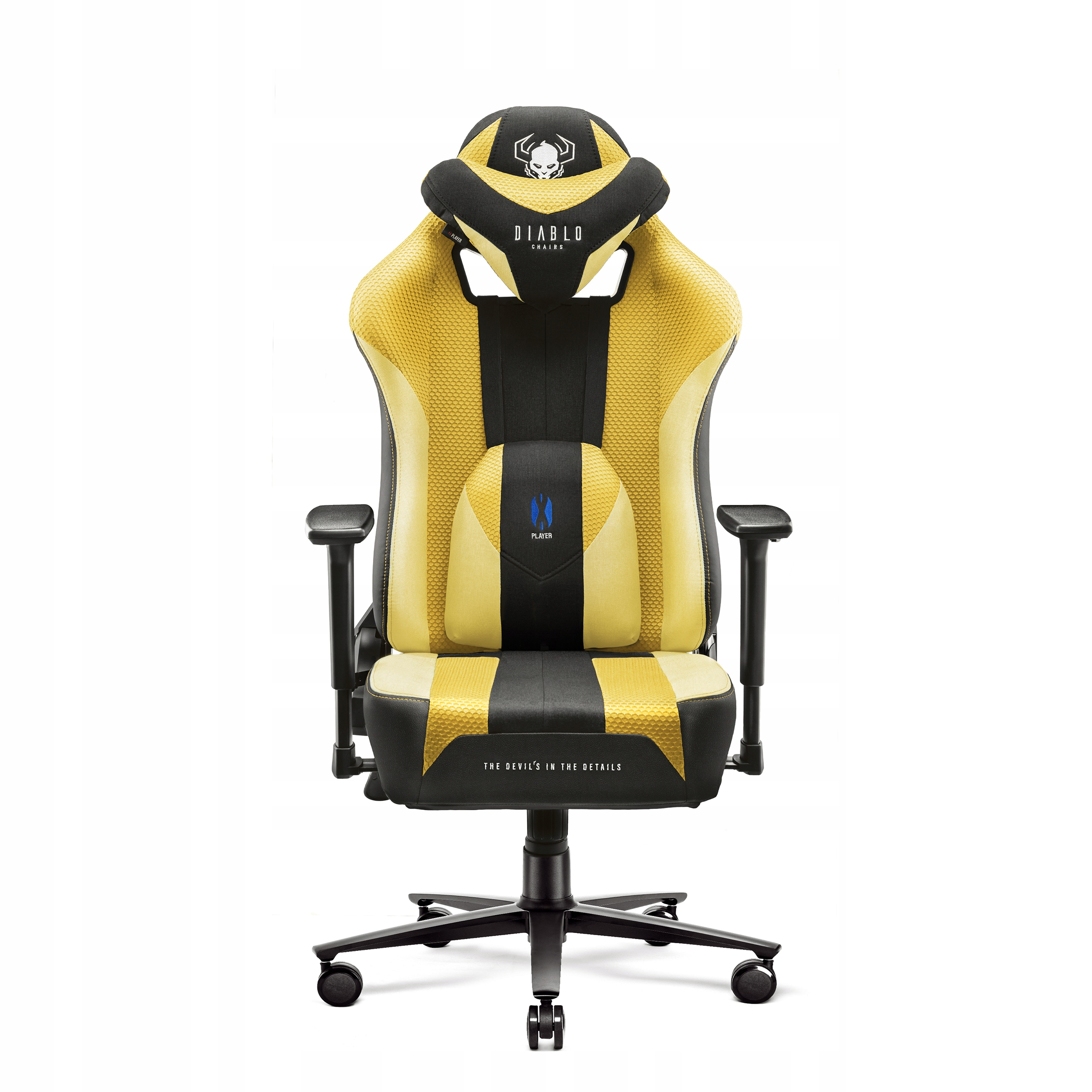 Żółto-czarny fotel gamingowy. Fotel ma logo czaszki na zagłówku i tekst 'THE DEVIL'S IN THE DETAILS'.