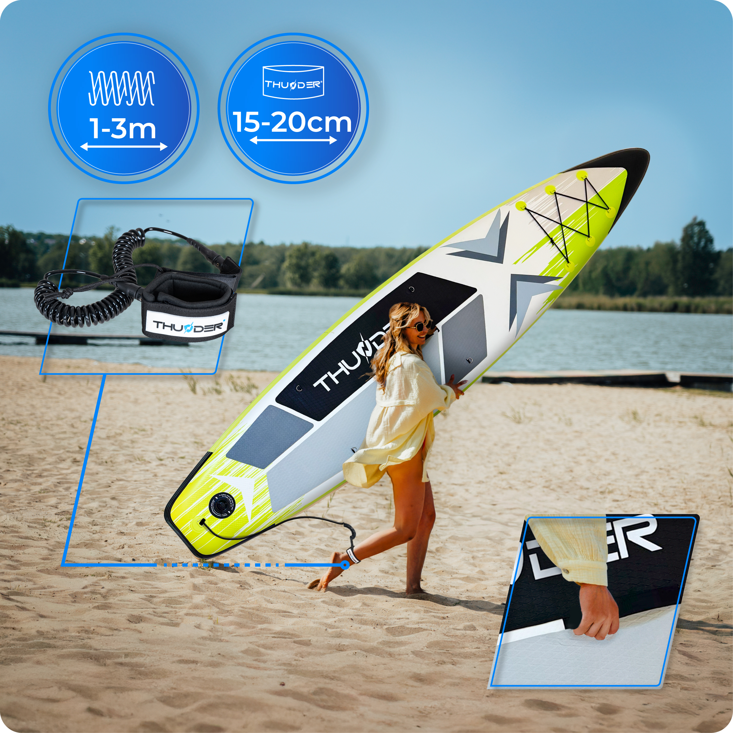 Kobieta niesie deskę do wiosłowania na piaszczystej plaży. Deska jest żółta, czarna i biała. W tle jezioro i drzewa.