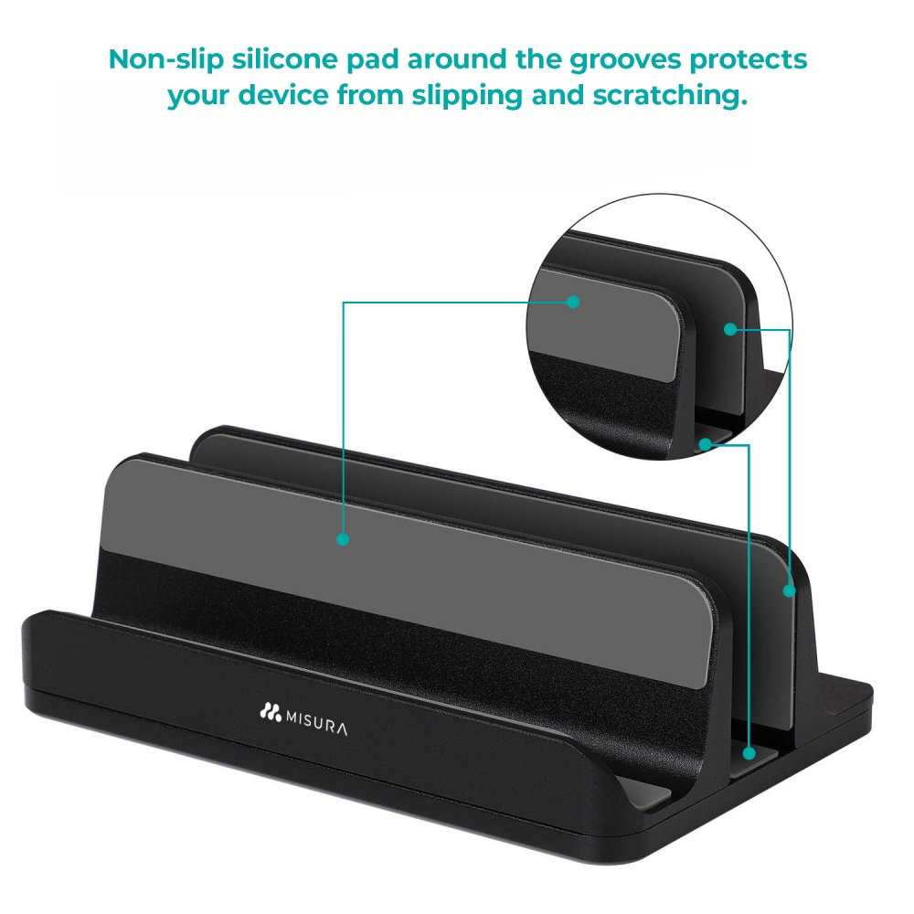 Supporto MISURA nero con cuscinetti in silicone grigio. Supporta dispositivi e previene graffi. Testo: 'Cuscinetto in silicone...'