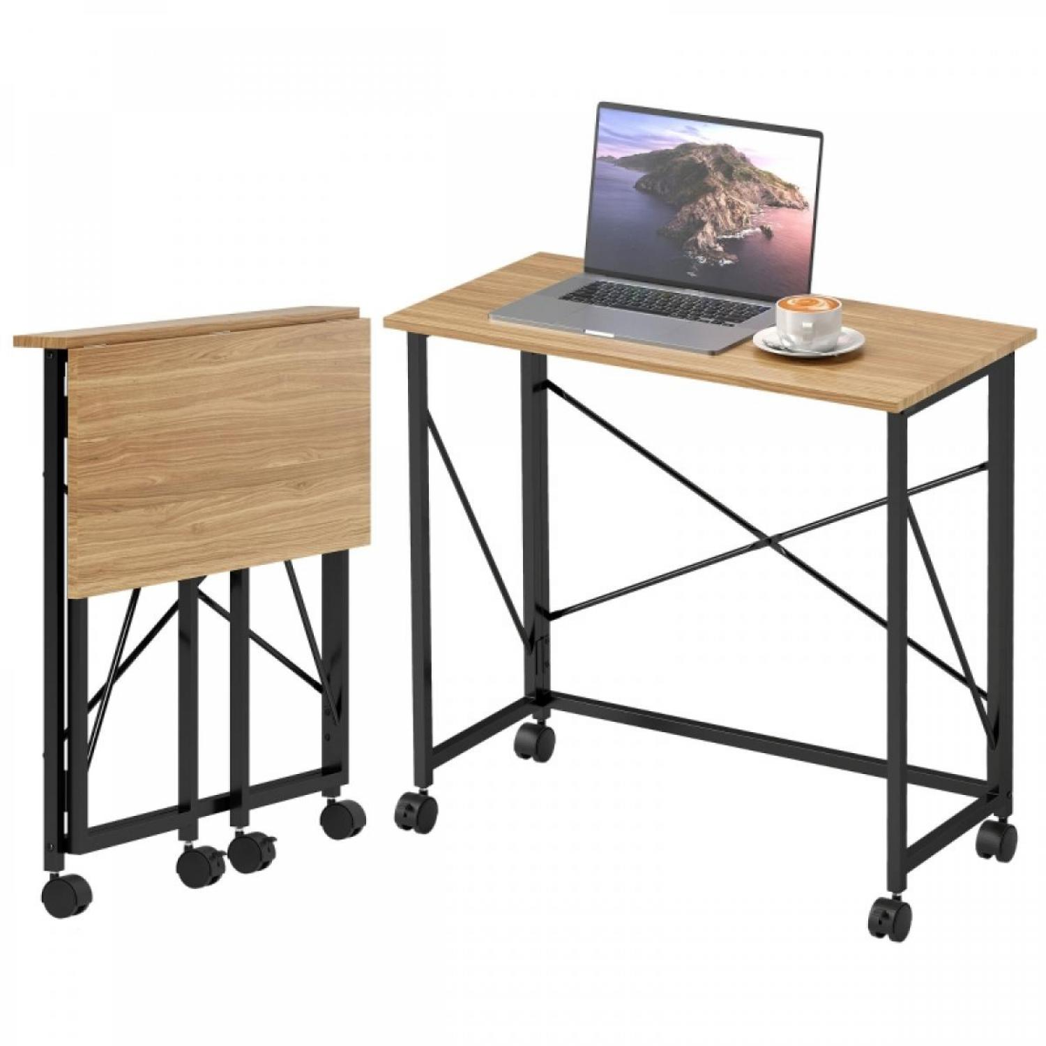 Ein zusammenklappbarer Schreibtisch mit Laptop und Kaffeetasse. Der Schreibtisch hat Holzmaserung, schwarze Metallbeine und Räder. Ein weiterer Schreibtisch ist zusammengeklappt.