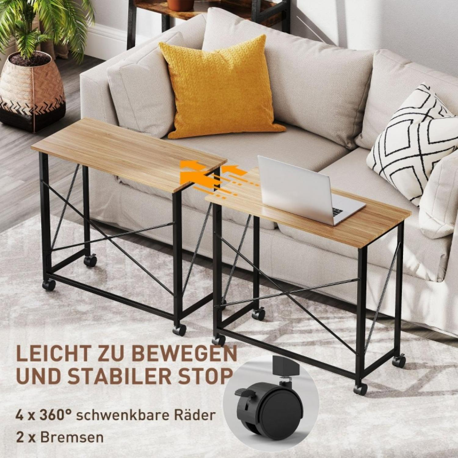 Zwei mobile Tische mit Holzplatten und schwarzen Rahmen. Auf einem steht ein Laptop. Ein Sofa, eine Pflanze und Text auf Deutsch sind auch zu sehen.