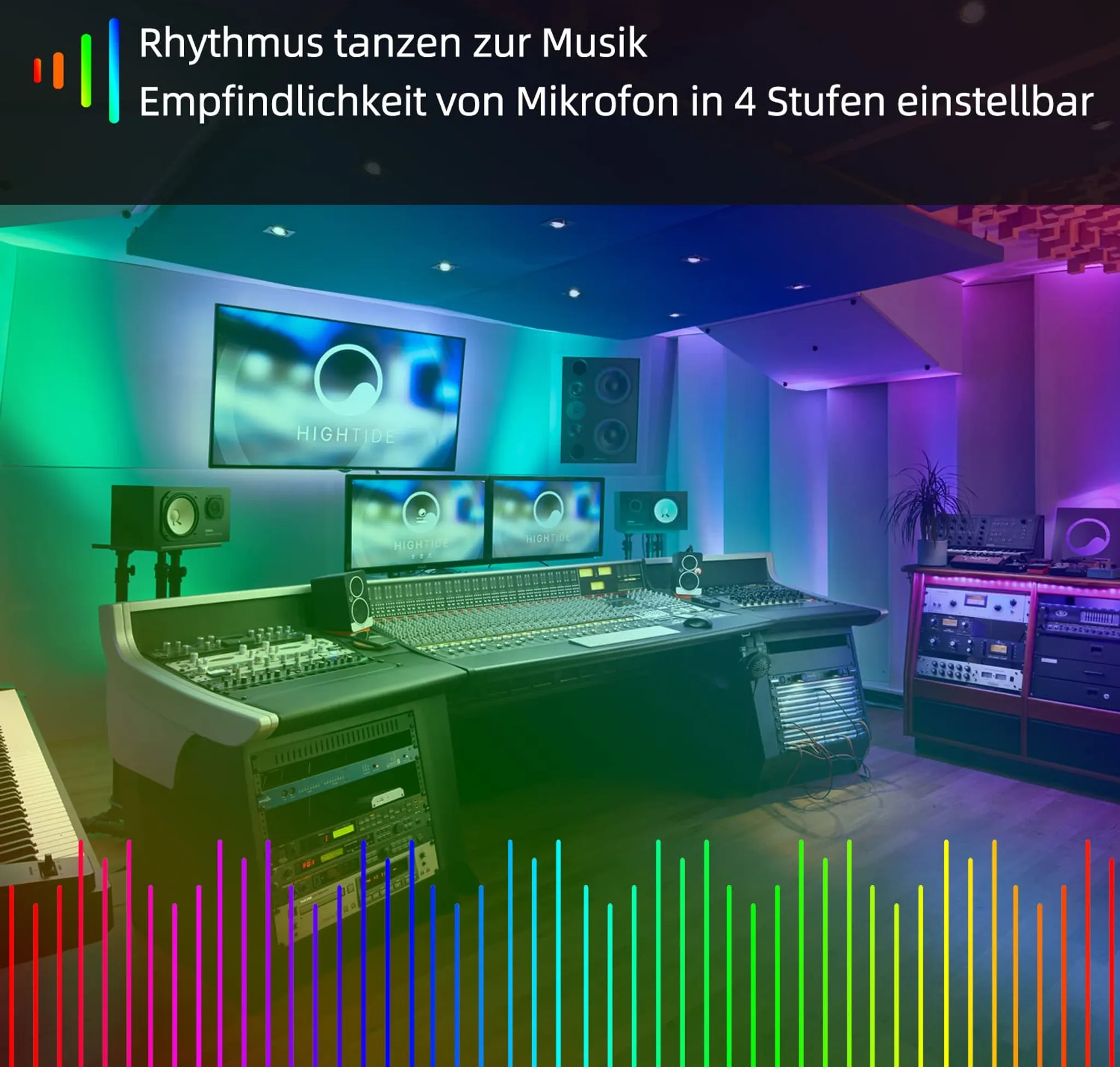Tonstudio mit Mischpult, Lautsprechern und Monitoren. Bunte Lichter und eine Tastatur sind ebenfalls zu sehen.