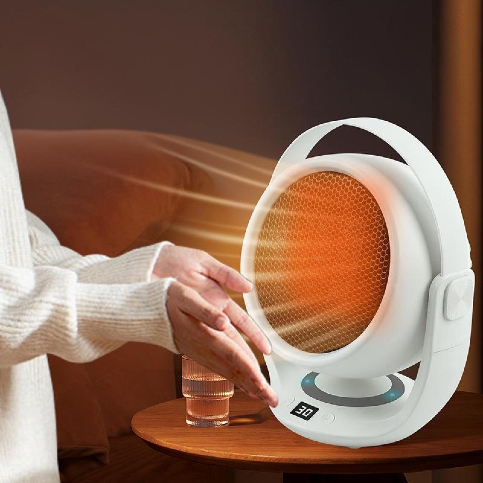 Hände einer Frau in der Nähe einer weißen Heizung. Die Heizung hat ein orangefarbenes Heizelement und eine digitale Anzeige mit 30.