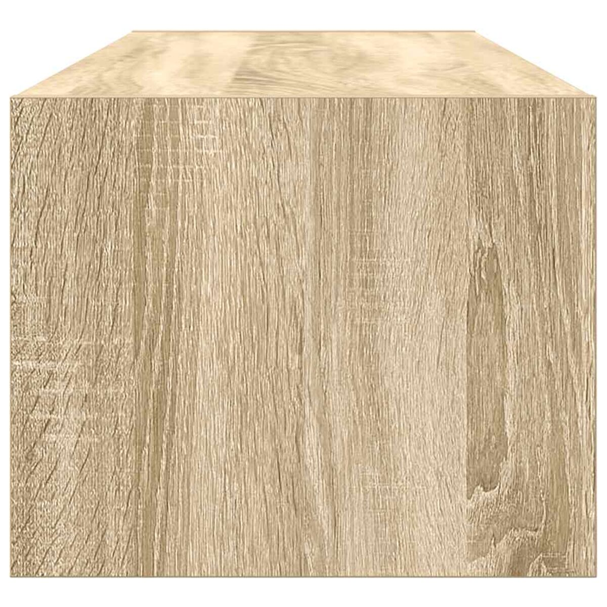 Ein hellbrauner Holzblock, wahrscheinlich ein Möbelstück, mit sichtbaren Holzmaserungen. Der Block ist rechteckig und massiv.