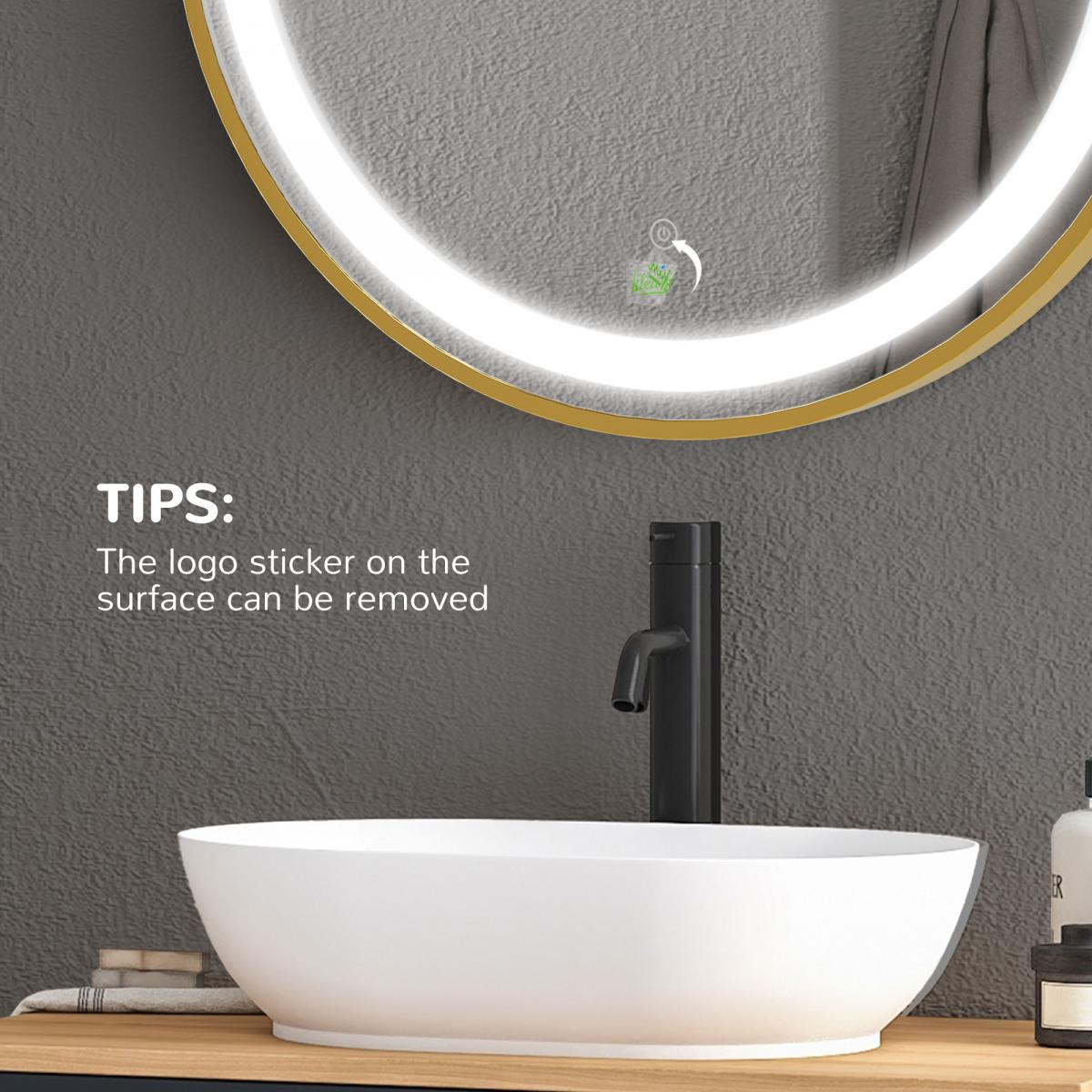 Badezimmer Szene mit einem runden Spiegel mit Lichtern, einem weißen Waschbecken und einem schwarzen Wasserhahn. Die Wand ist grau.