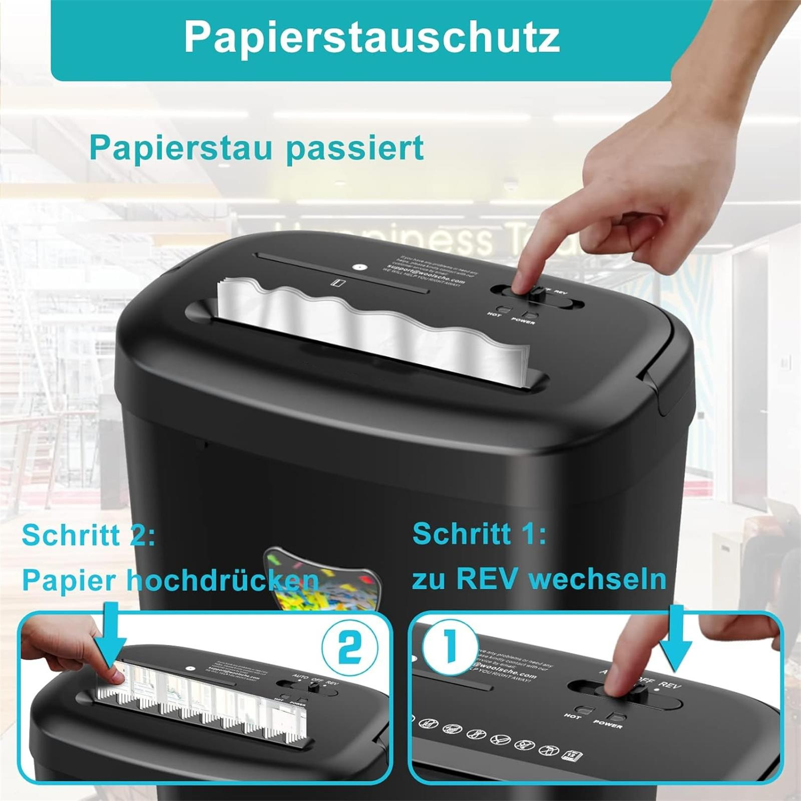 Ein schwarzer Aktenvernichter mit einer Hand, die einen Knopf drückt. Anweisungen zur Papierstauentfernung werden angezeigt.