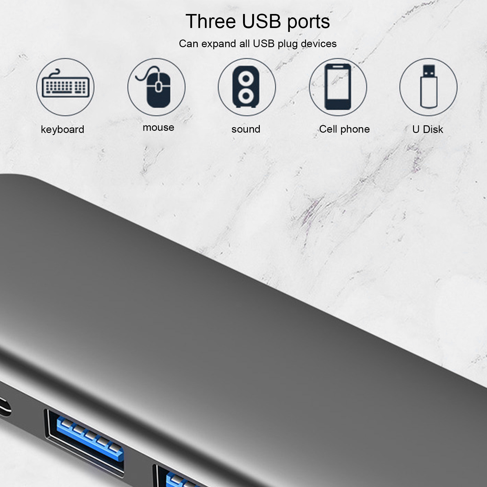 Ein grauer USB-Hub mit blauen Anschlüssen. Icons für Tastatur, Maus, Sound, Handy und U-Diskette sind darüber.