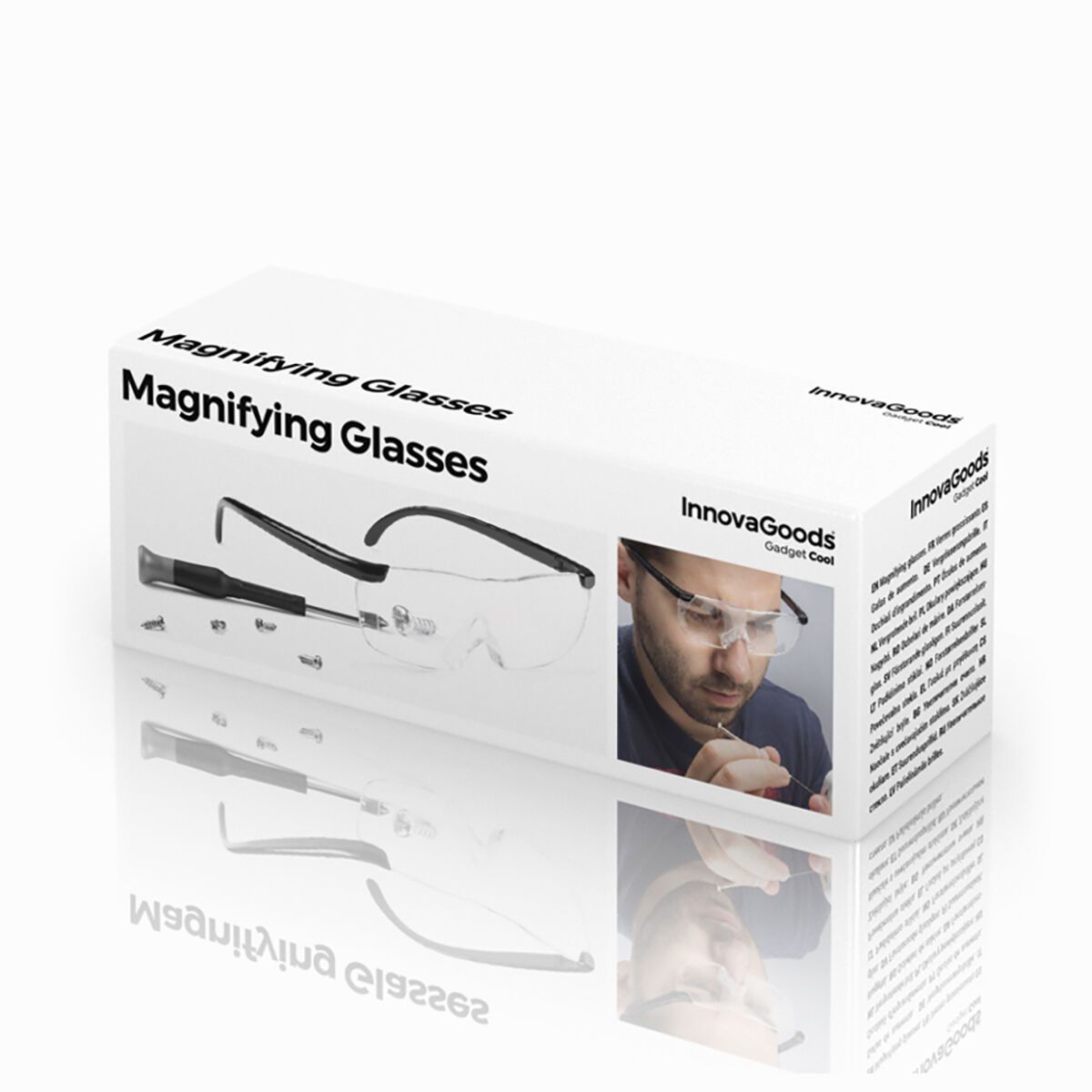 Caja con gafas de aumento. Muestra gafas, piezas y una persona usándolas. Fondo blanco con reflejos.