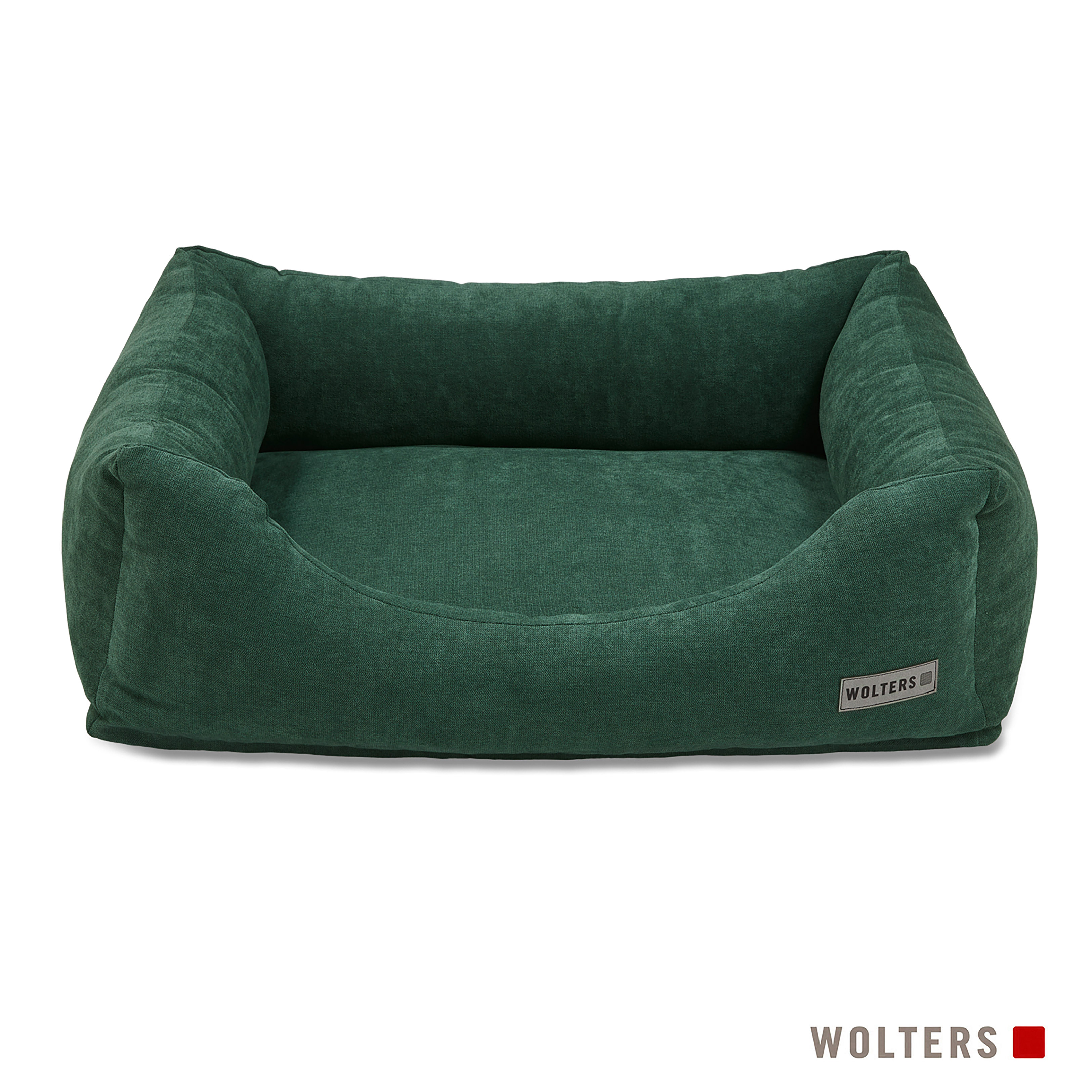 Ein grünes Hundebett. Das Bett ist rechteckig mit erhöhten Seiten, und der Markenname Wolters steht an der Seite.