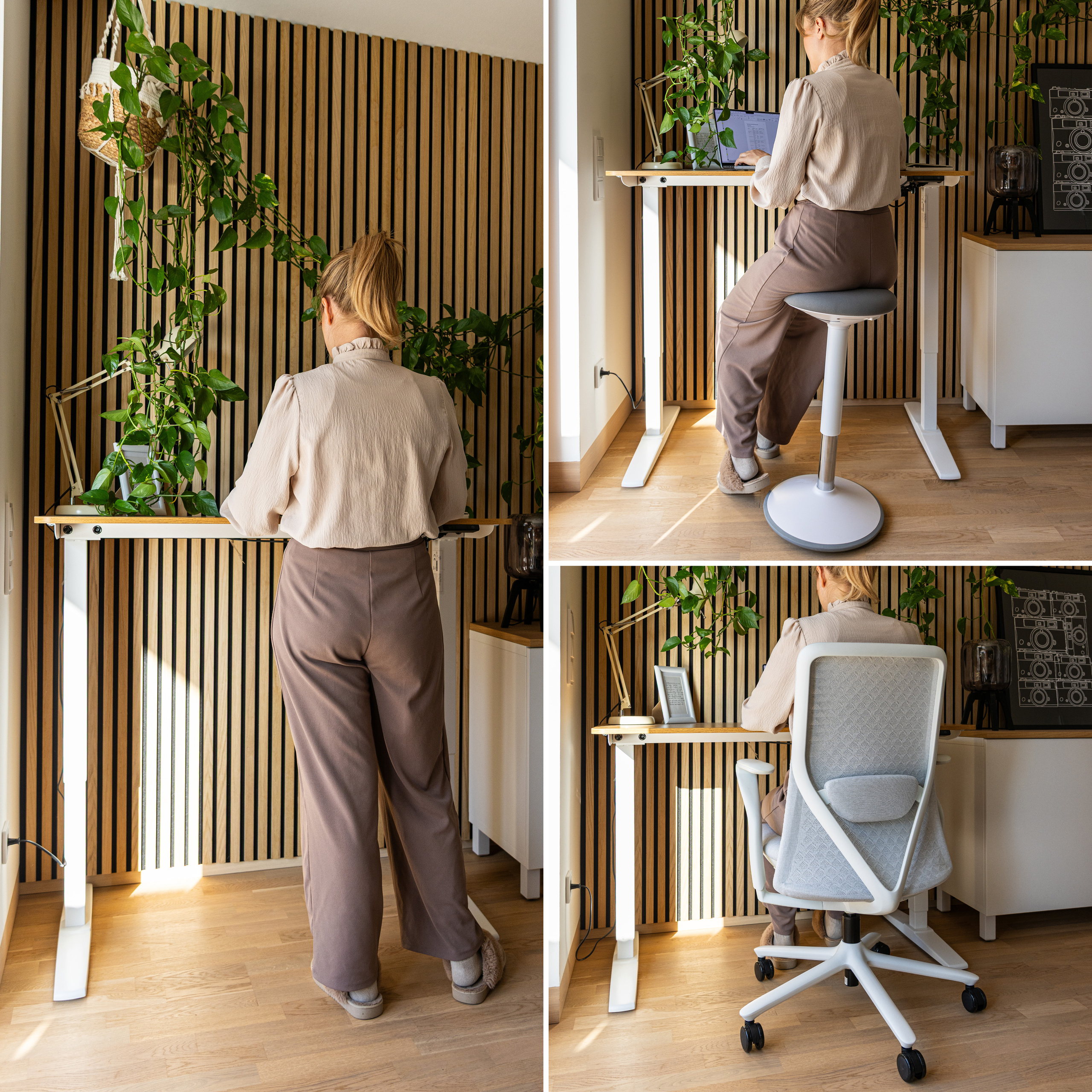 Eine Frau arbeitet an einem Schreibtisch mit Pflanzen, einer weißen Lampe und einem Holzhintergrund. Sie trägt ein helles Oberteil und braune Hose.