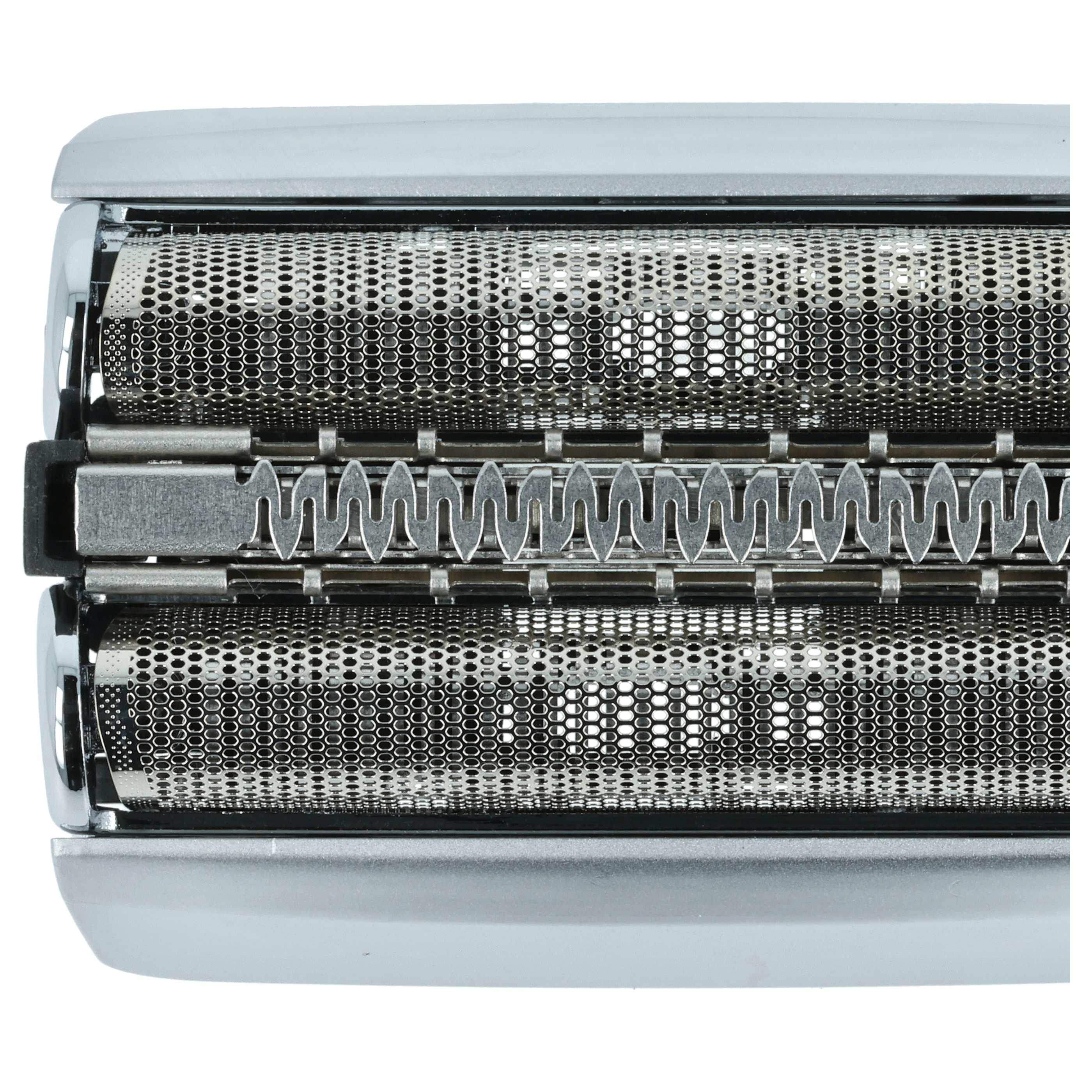Nahaufnahme eines silbernen Elektrorasiererkopfes. Der Kopf hat zwei perforierte Metallfolien und eine mittlere Trimmerklinge.
