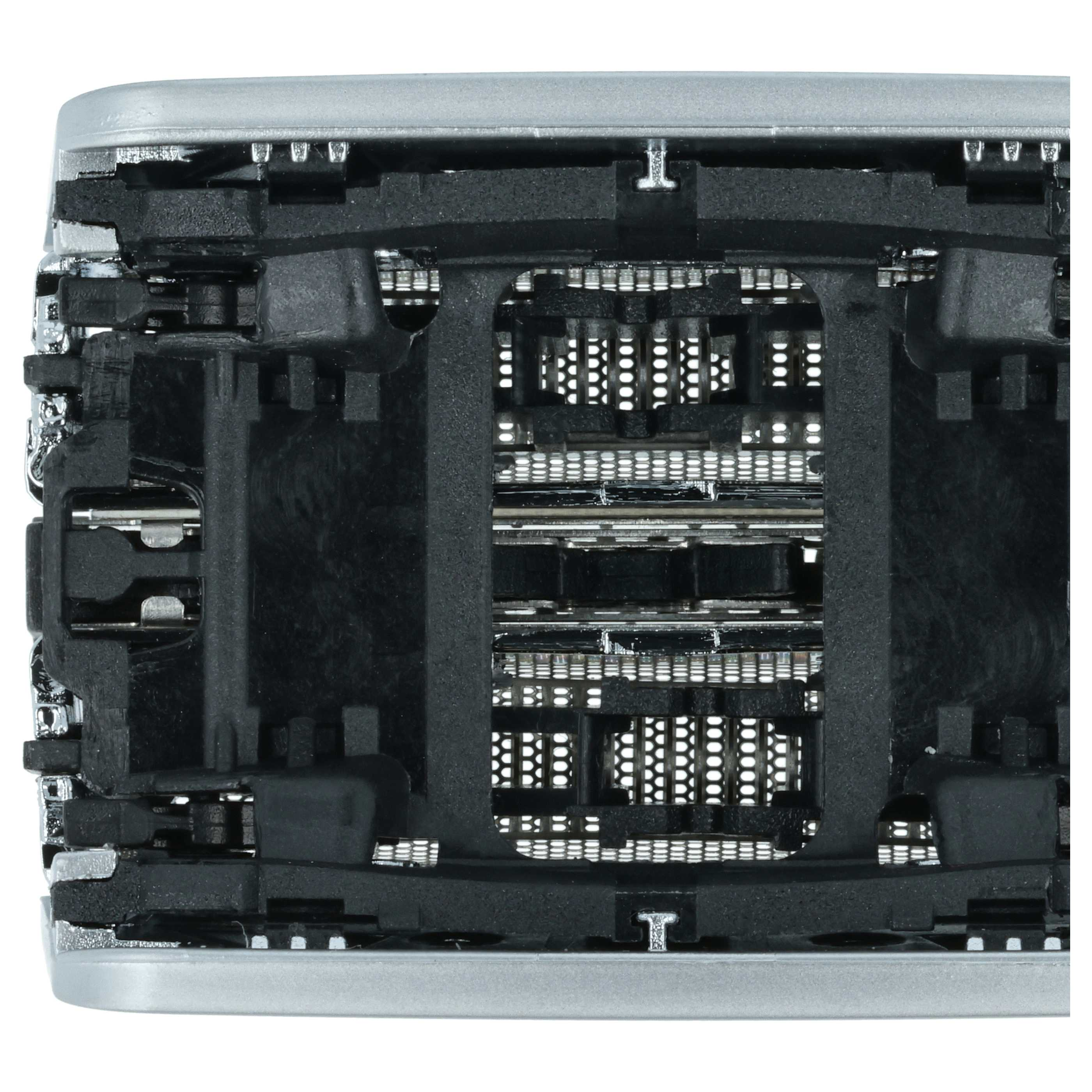 Nahaufnahme der Innenkomponenten eines Elektrorasierers. Schwarze Kunststoffteile, silbernes Metall und detaillierte Gitterstrukturen sind sichtbar.