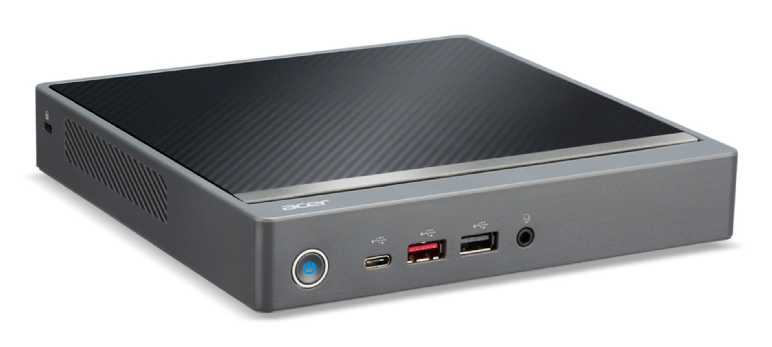 Un piccolo computer Acer grigio. Ha una parte superiore strutturata grigio scuro e varie porte nella parte anteriore.