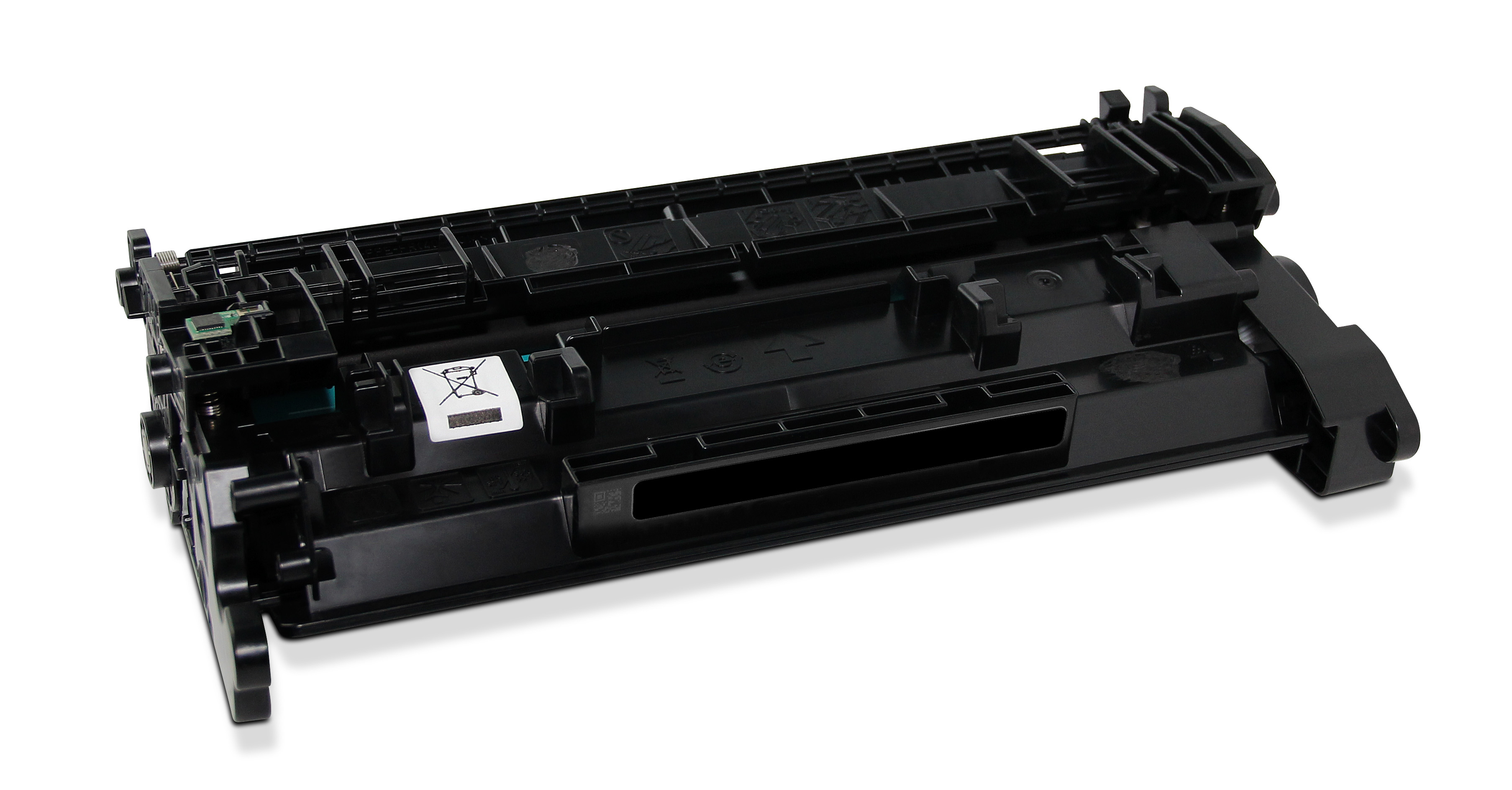 Una cartuccia toner nera per stampante è su una superficie bianca. Ha varie forme e dettagli, con un'etichetta bianca.