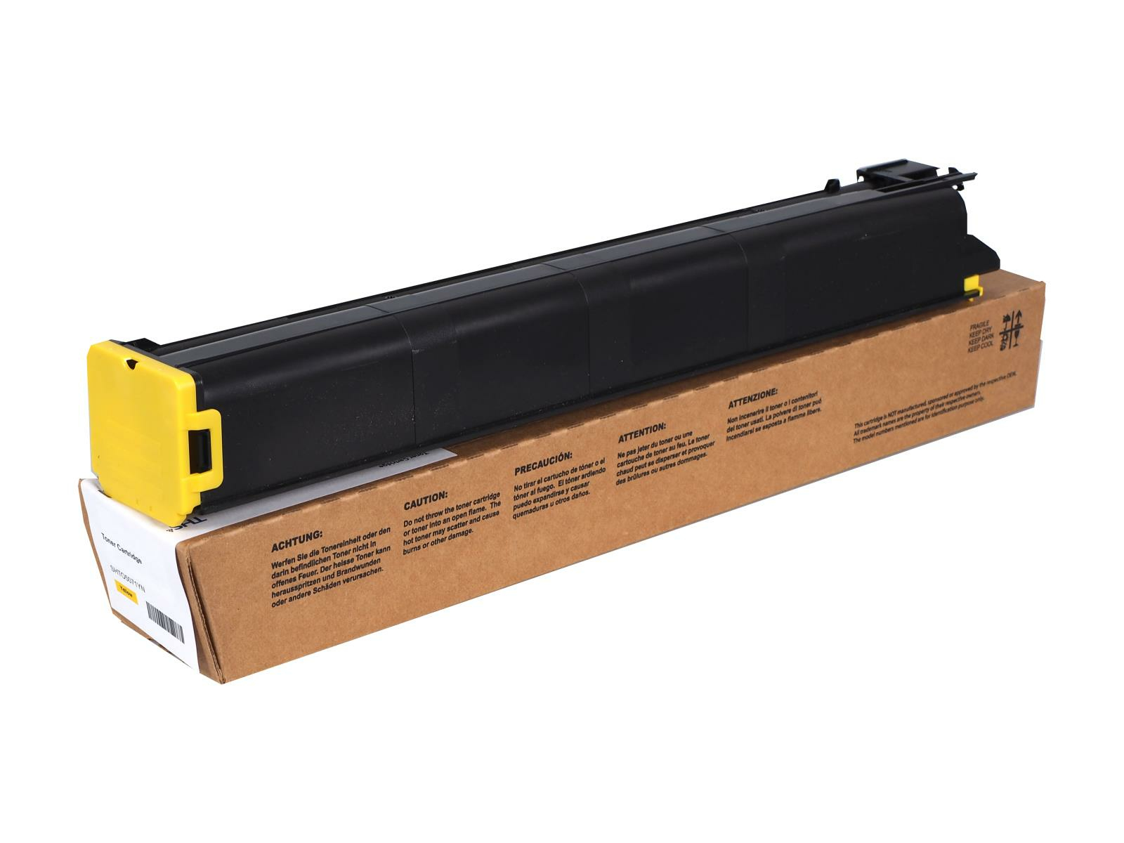 Una cartuccia toner nera con tappi gialli, posta su una scatola di cartone marrone, con etichette di avvertimento multilingue.