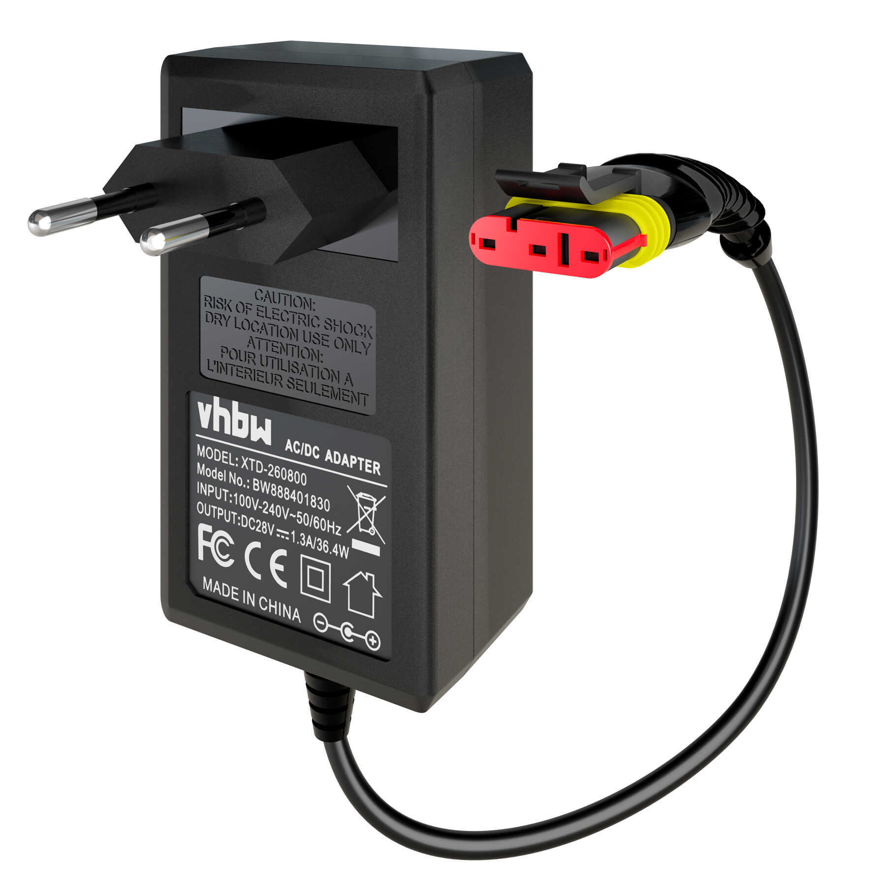 Schwarzer AC/DC-Adapter mit Stecker. Er hat ein Kabel mit einem roten und gelben Stecker. Auf ihm steht: Vorsicht, AC/DC-Adapter.