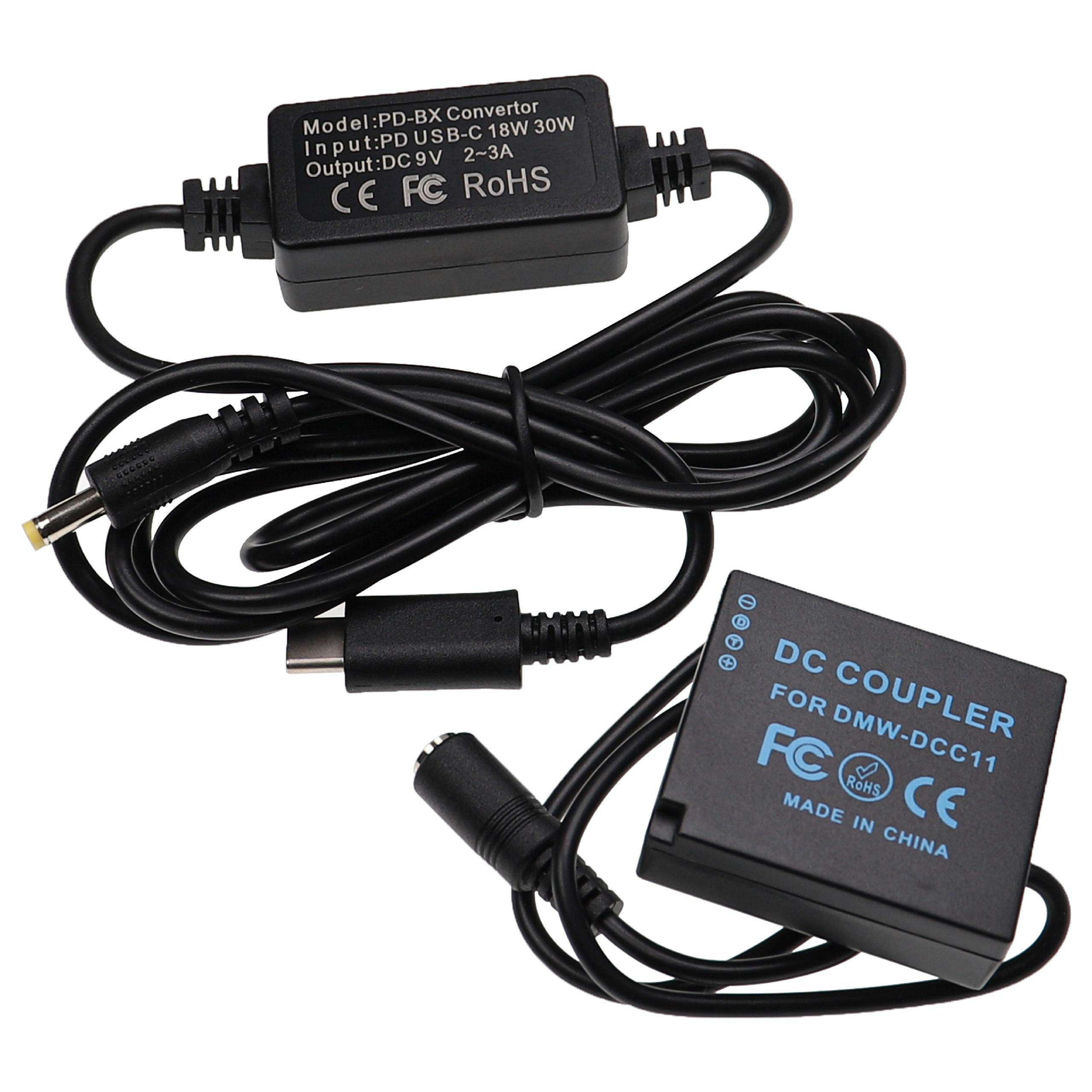 Zwei schwarze elektronische Geräte mit Kabeln. Eines ist mit 'PD-BX Converter' beschriftet. Das andere mit 'DC COUPLER'.