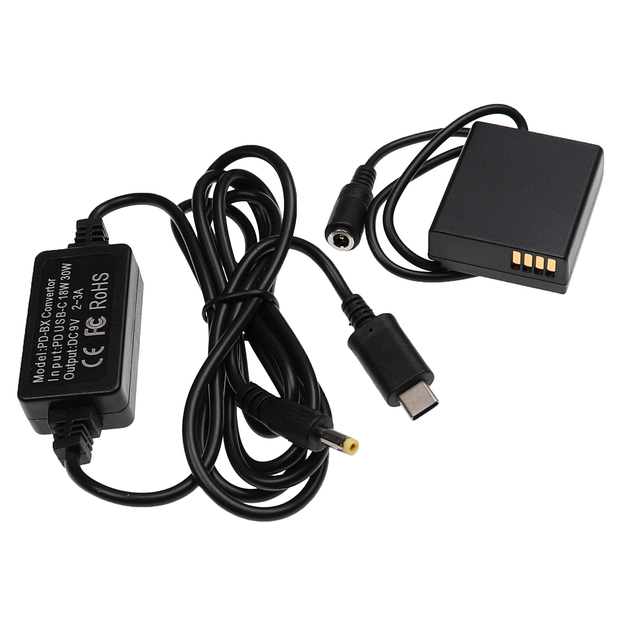 Schwarzes Konverter-Set mit mehreren Anschlüssen und Kabeln, darunter USB-C und DC, vor weißem Hintergrund.