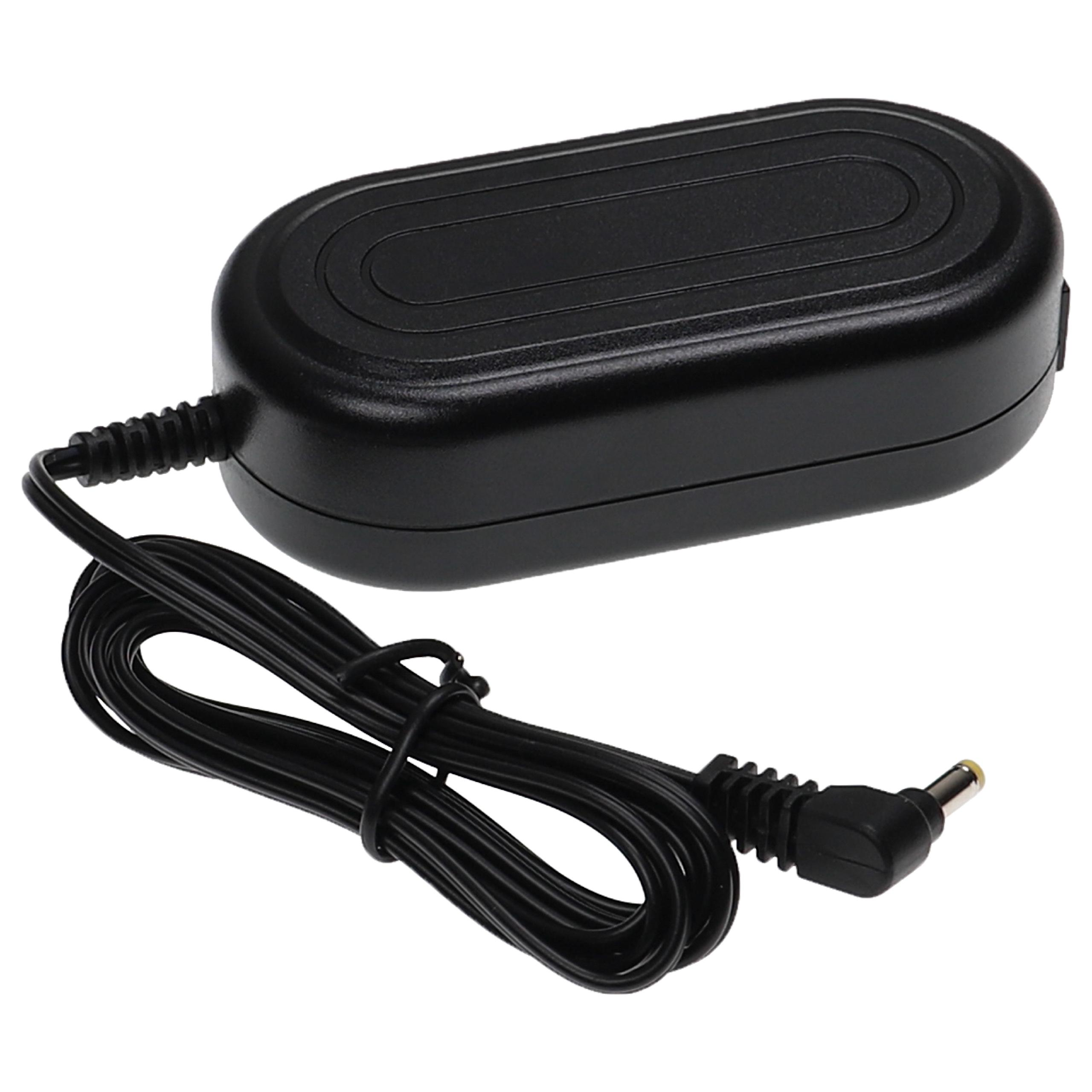 Ein schwarzes, ovales Netzteil mit schwarzem Kabel. Das Kabel hat einen Stecker am Ende.