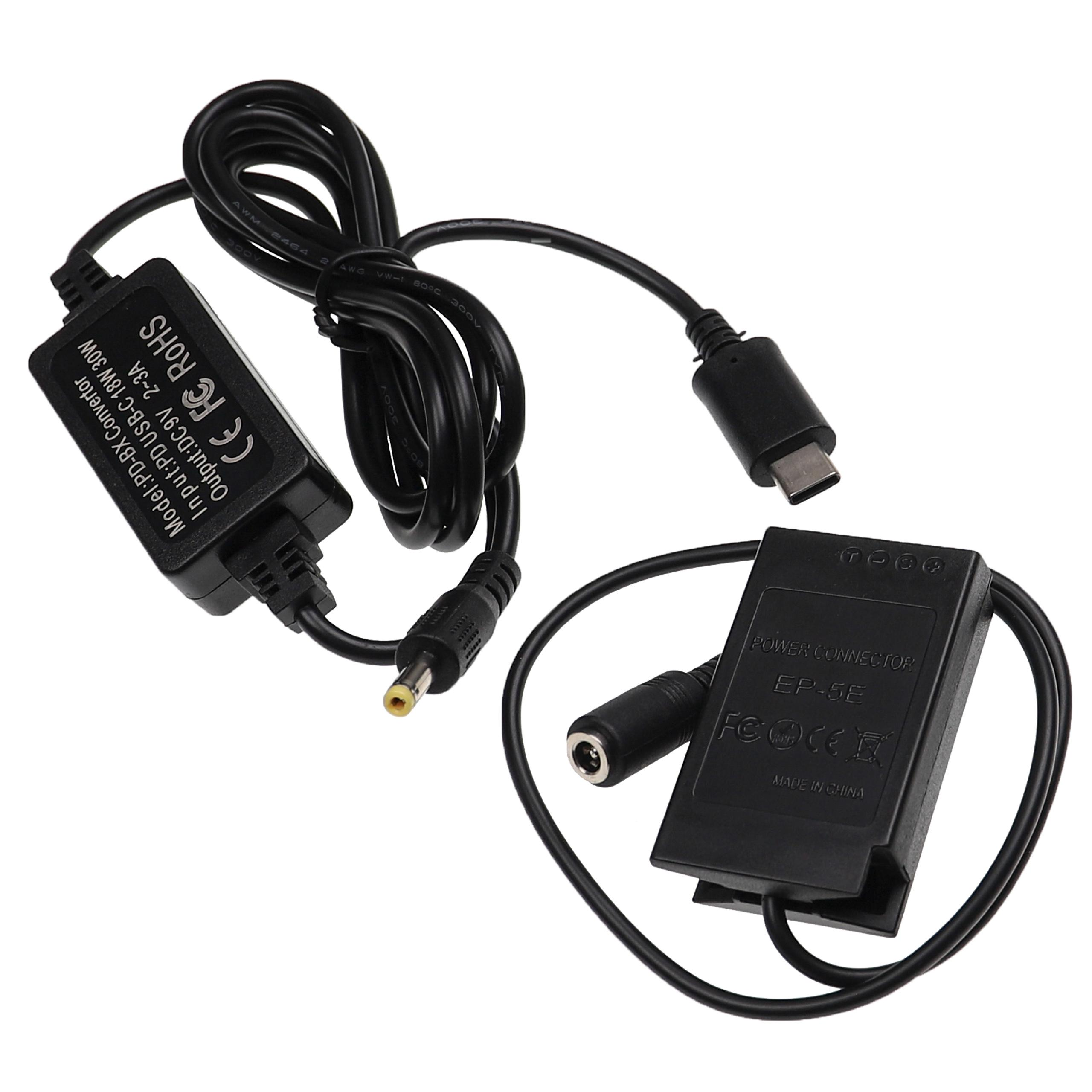 Zwei schwarze elektronische Geräte mit Kabeln. Eines ist ein Konverter, das andere ein Stromanschluss. Kabel und Anschlüsse sind sichtbar.