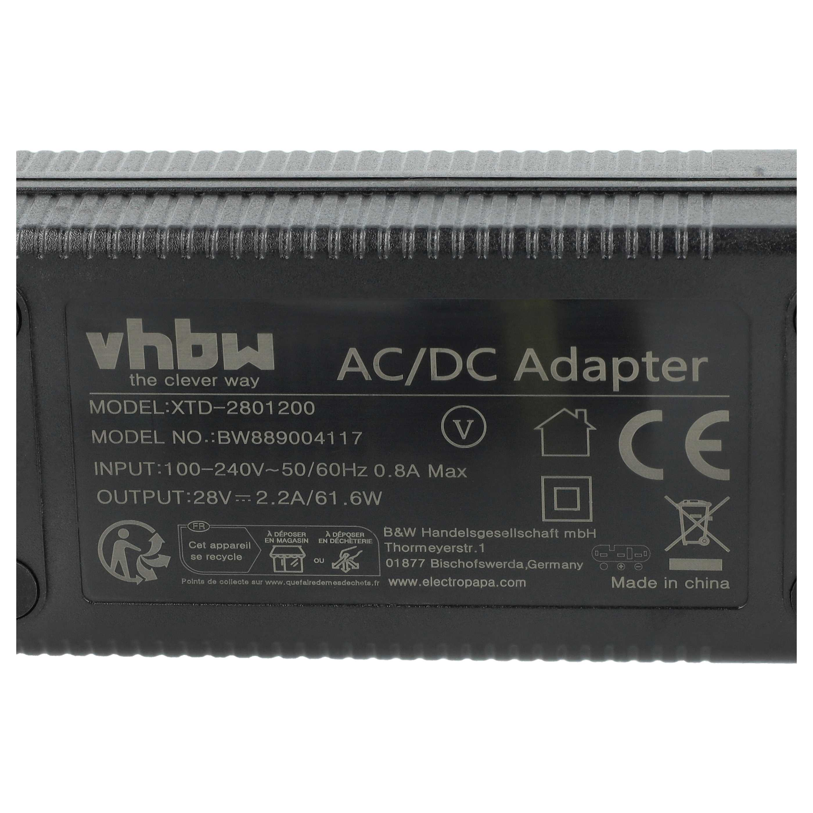 Schwarzer AC/DC-Adapter mit Text: vhbw, Modellinformationen und Recyclingsymbolen. Weißer Hintergrund.